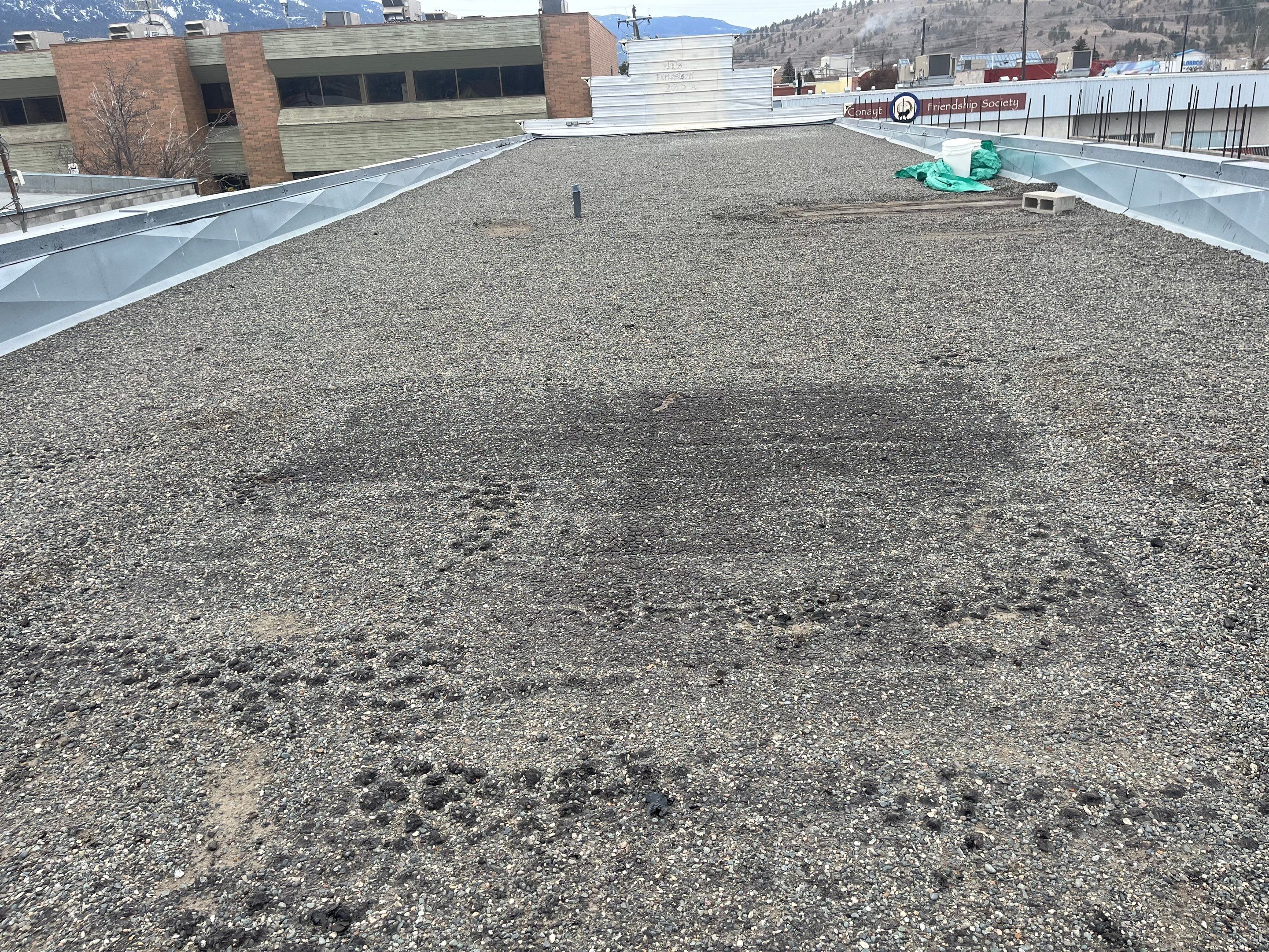 Commercial ReRoofing Installation using IKO 2ply sbs by Top Notch Roofing Inc