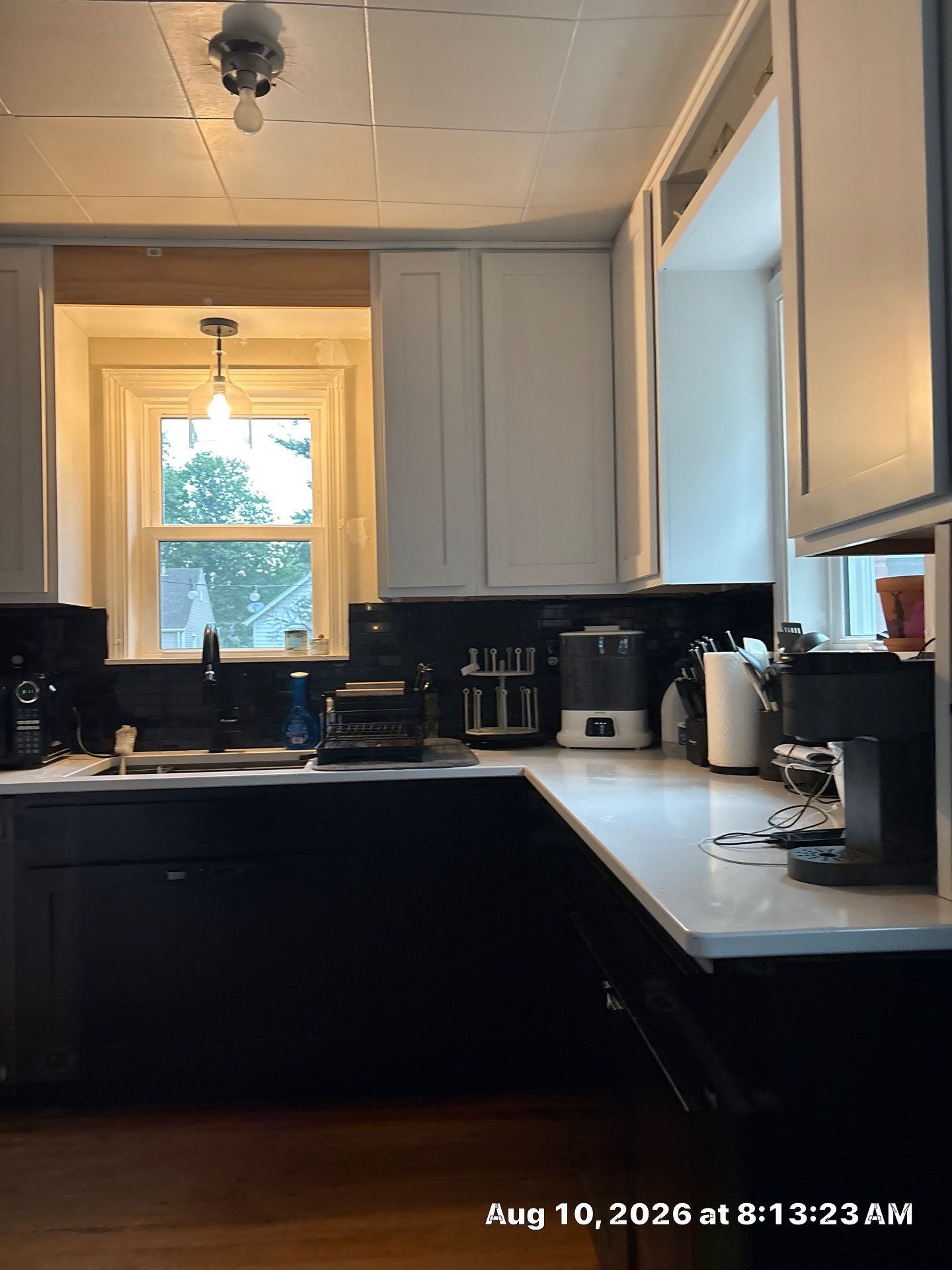 Modern Kitchen Renovation with Black and White Cabinetry in Lincoln by CompanyCam Sales Demo