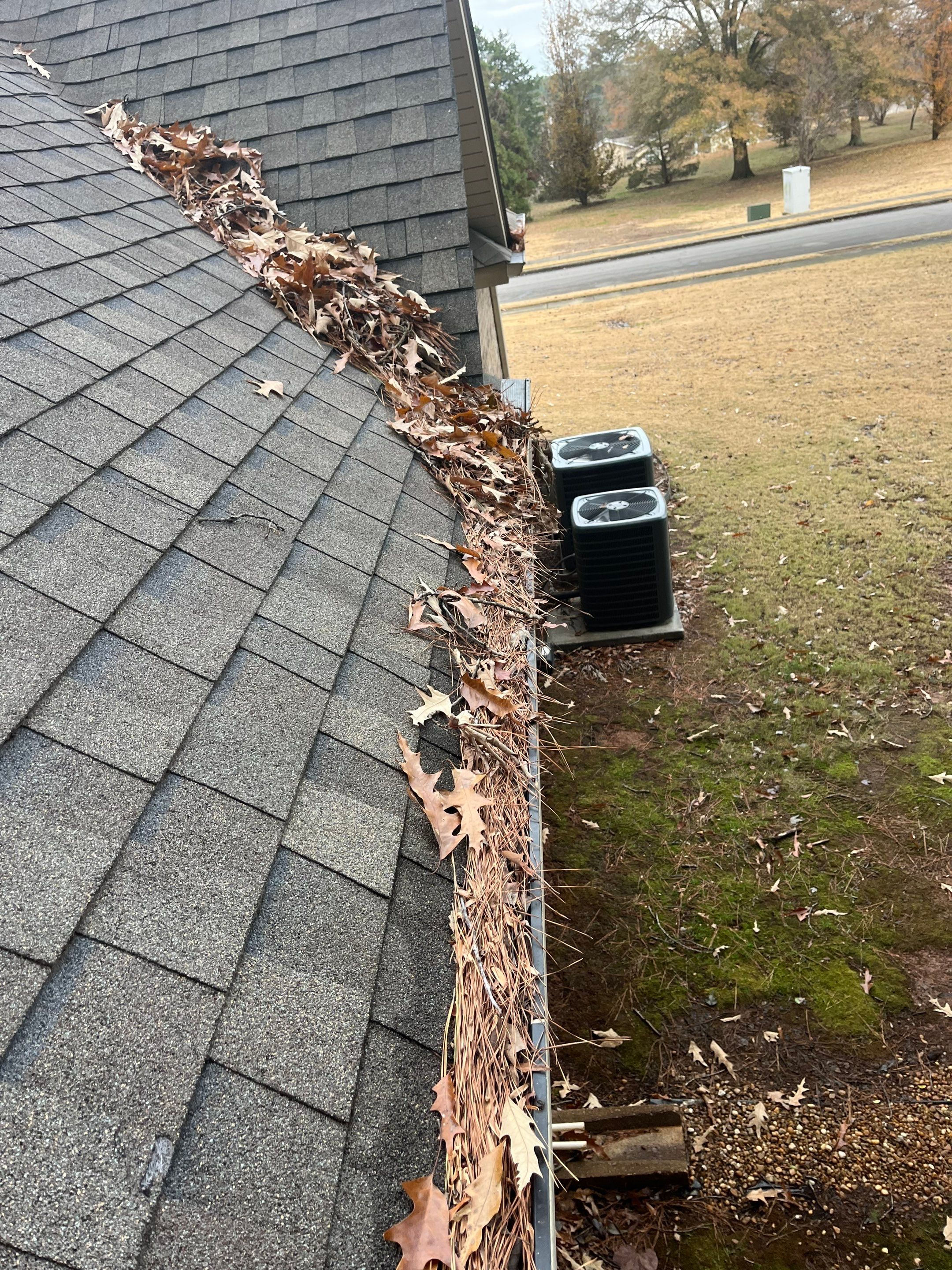 Commercial gutter cleaning Huntsville, AL before photo with filled gutters