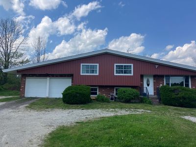 Siding Refresh with Cert S/7 Reverse Board & Batten, Autumn Red