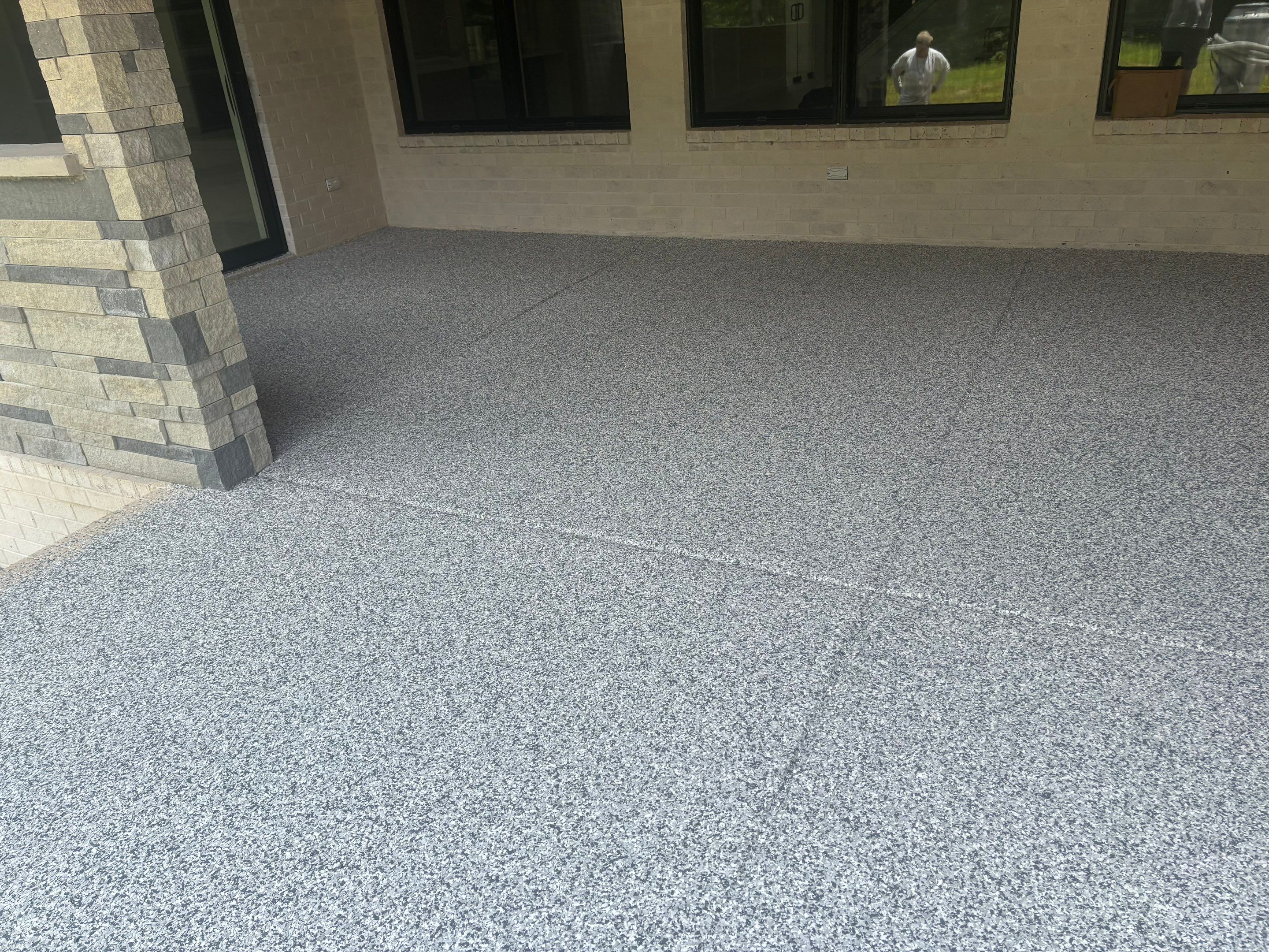 Porch & Garage Using Tidal Wave & Gravel  by Elite Floor Solutions