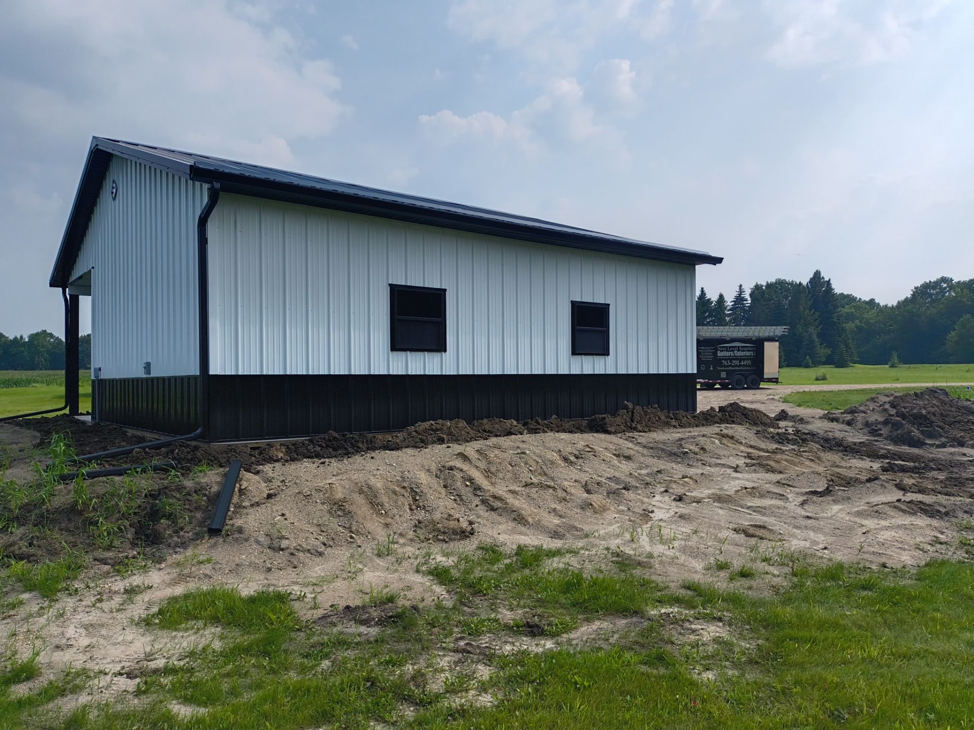 6-Inch K-Style Black Seamless Gutter Installation with Snow Rails – Dassel, MN by Next Level Seamless Gutters / Exteriors Inc.