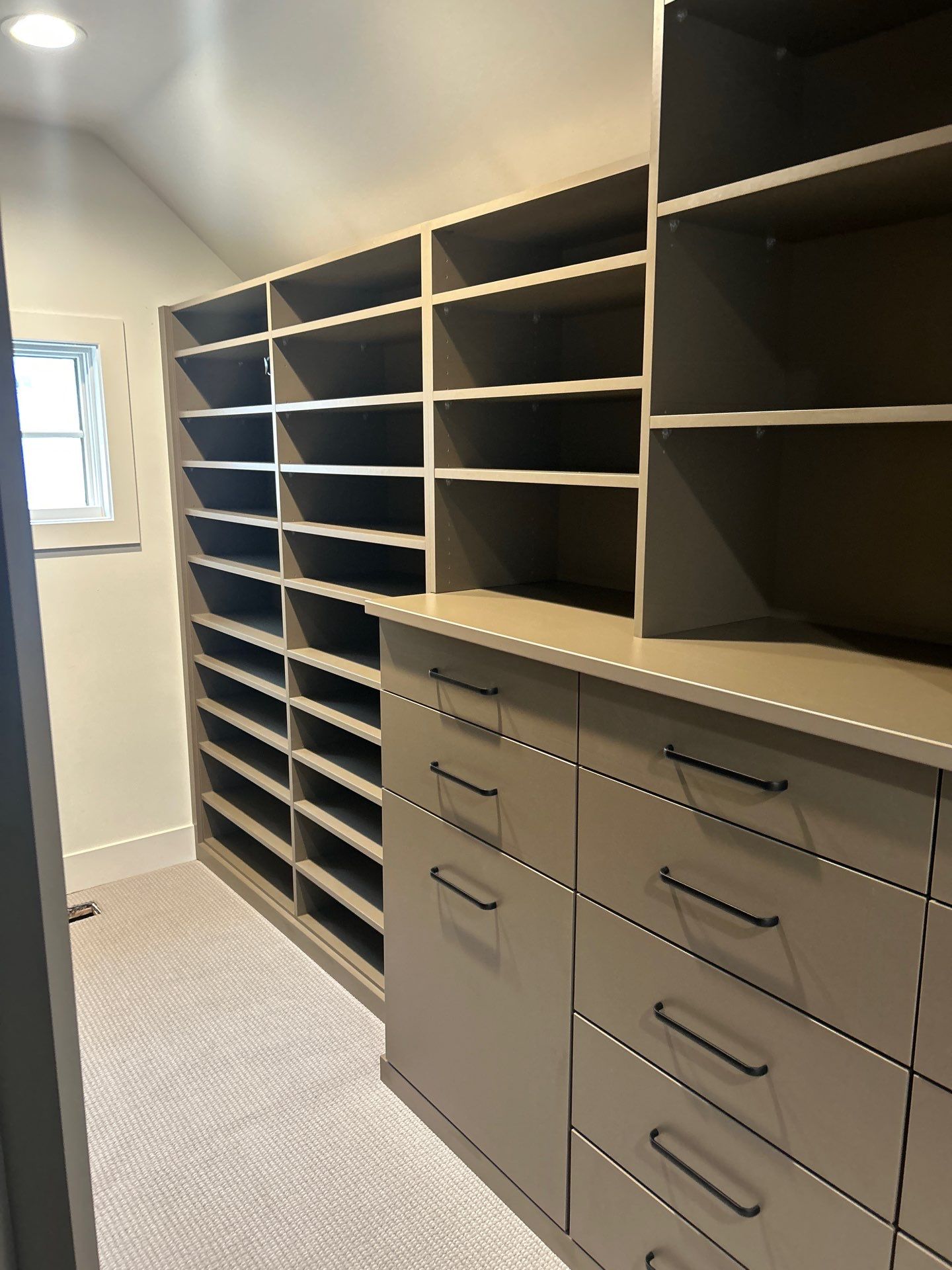 Enjoy a Morning Latte in this Walk-in Closet by Concept 32, Inc.