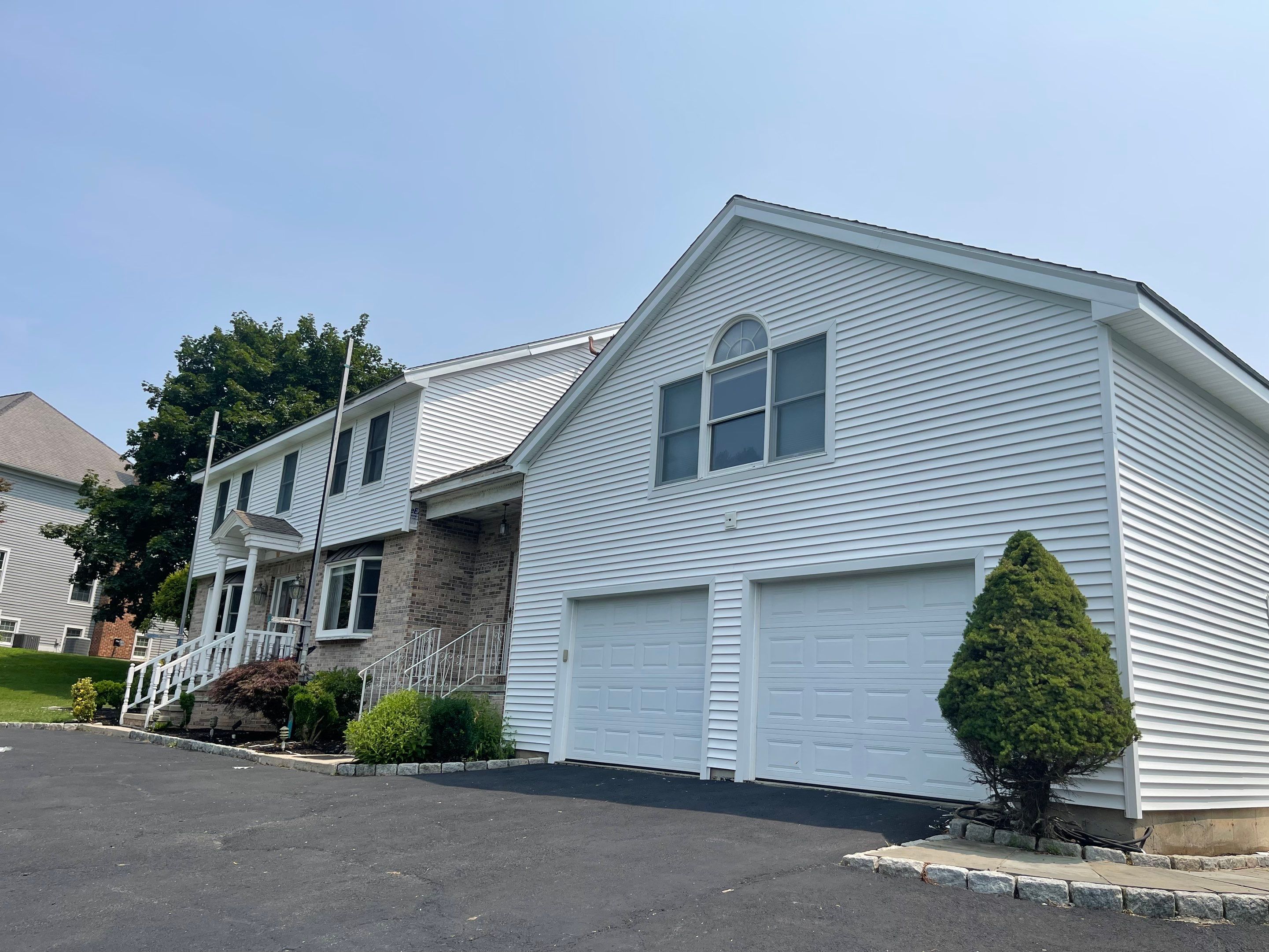 Siding Installation using Mainstreet Colonial & White gutters by A Plus Exterior