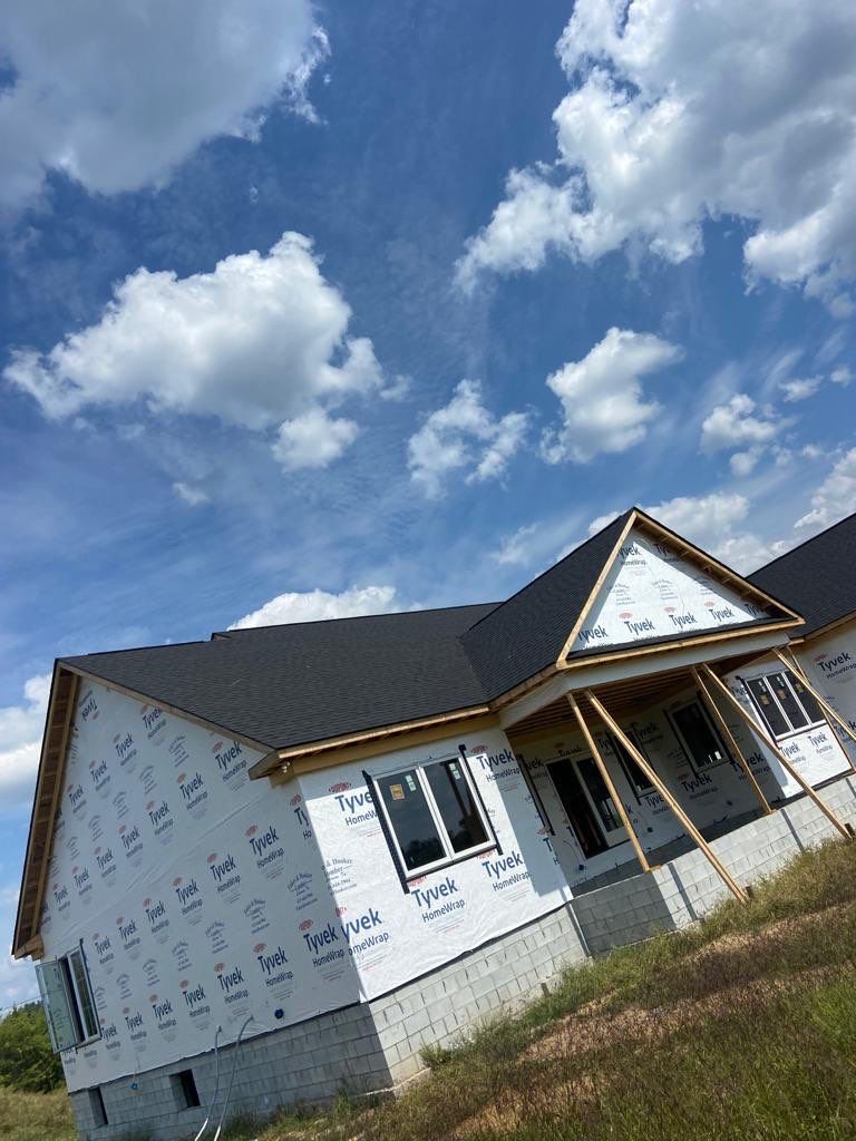 Residential Roofing Installation using Tamko Heritage AR with Standing Seam Metal Porch by Undersun Roofing 