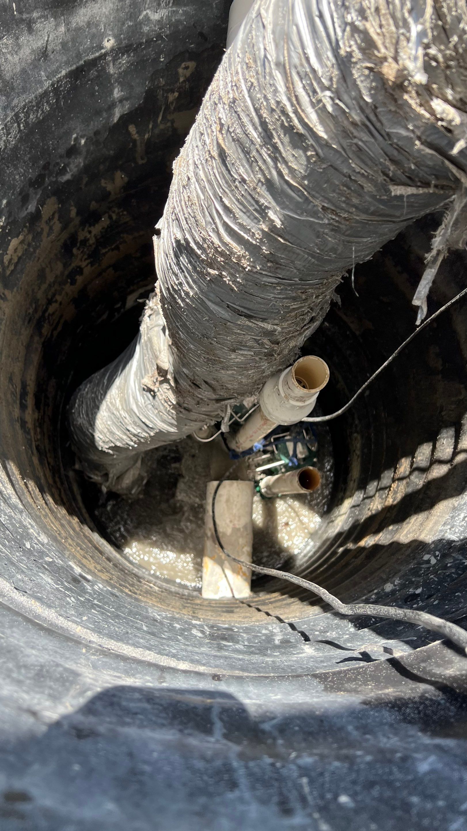 Isles of Capri Condo Parking Garage Drainage System Cleaning by APS Power & Water