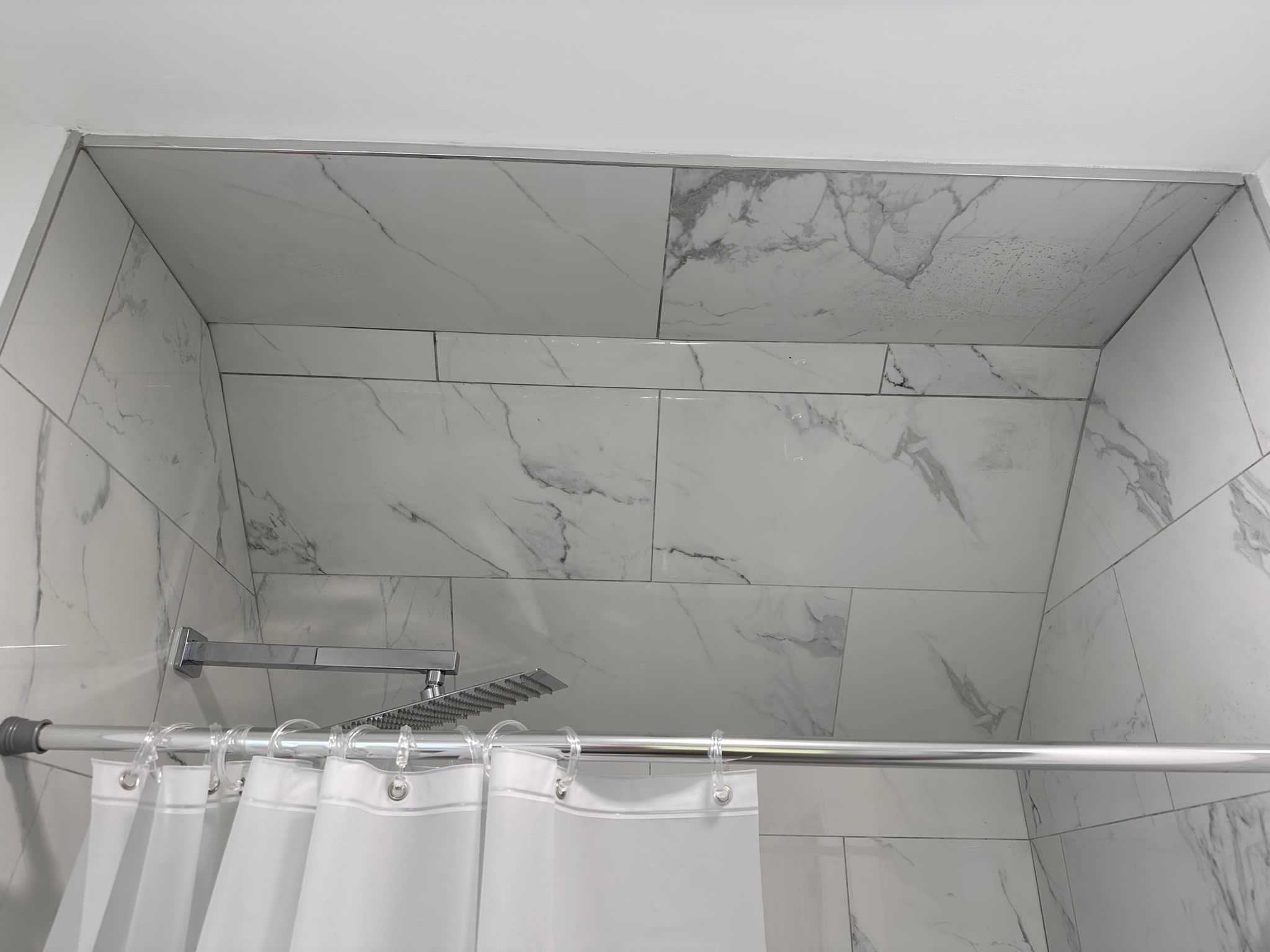 Bathroom Remodel using Tile by Home Concepts Construction