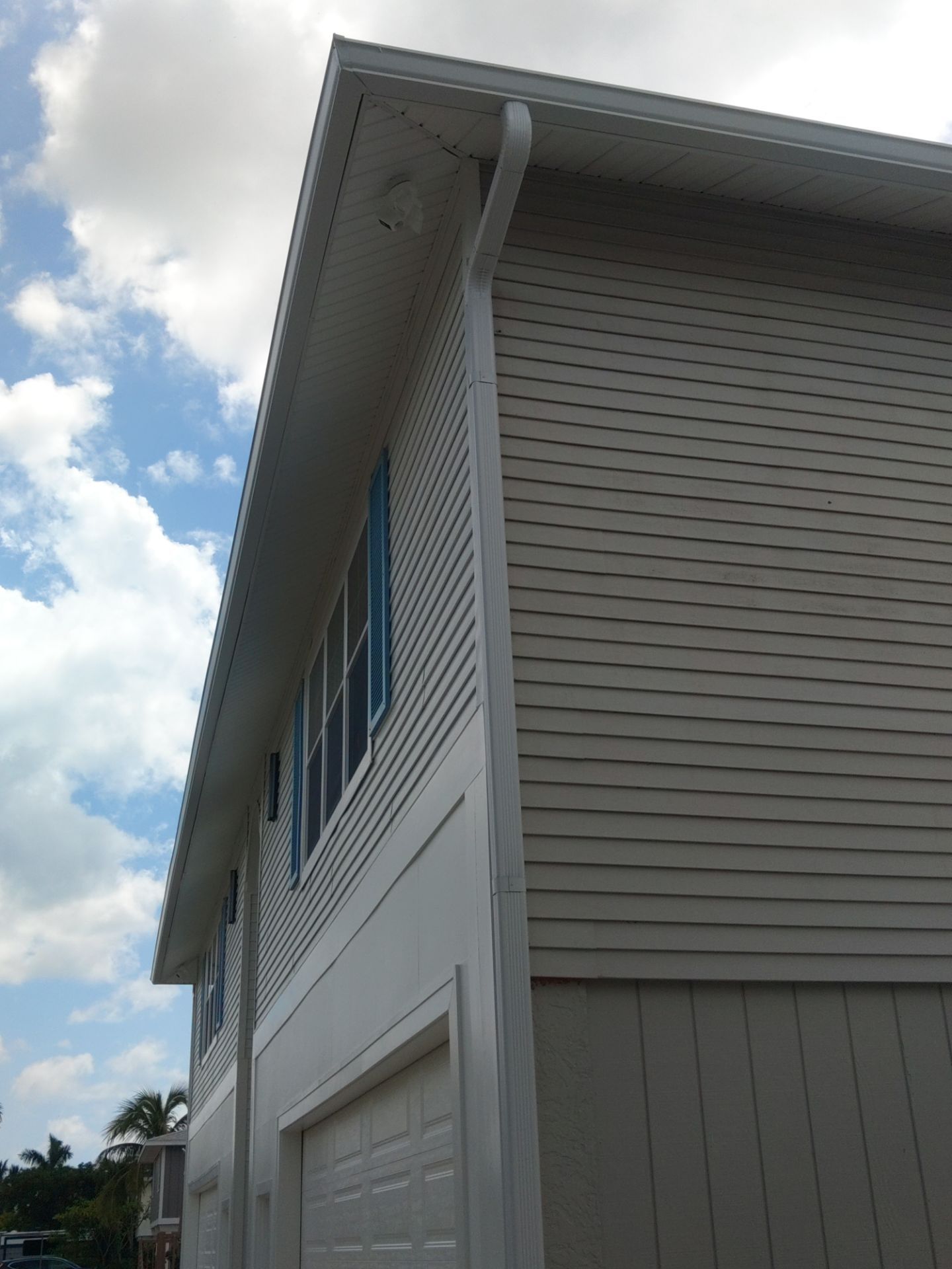 Complete Gutter System with Downspouts & Guards in Fort Myers Beach FL by Gutter Professors