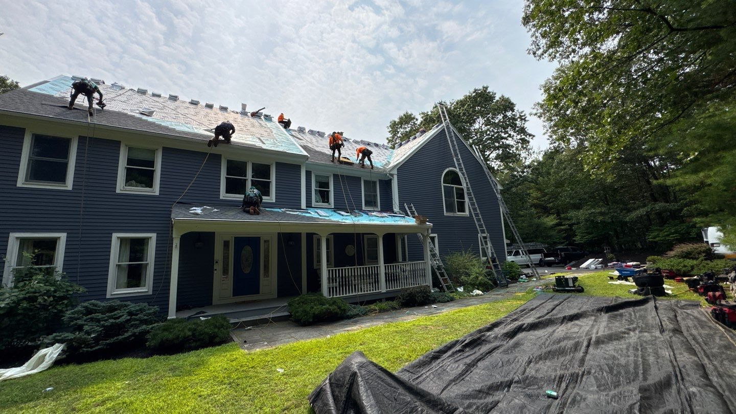 Solar-Ready Roof Replacement with GAF Pewter Gray Shingles & VELUX Skylights by Sensible Home Solutions
