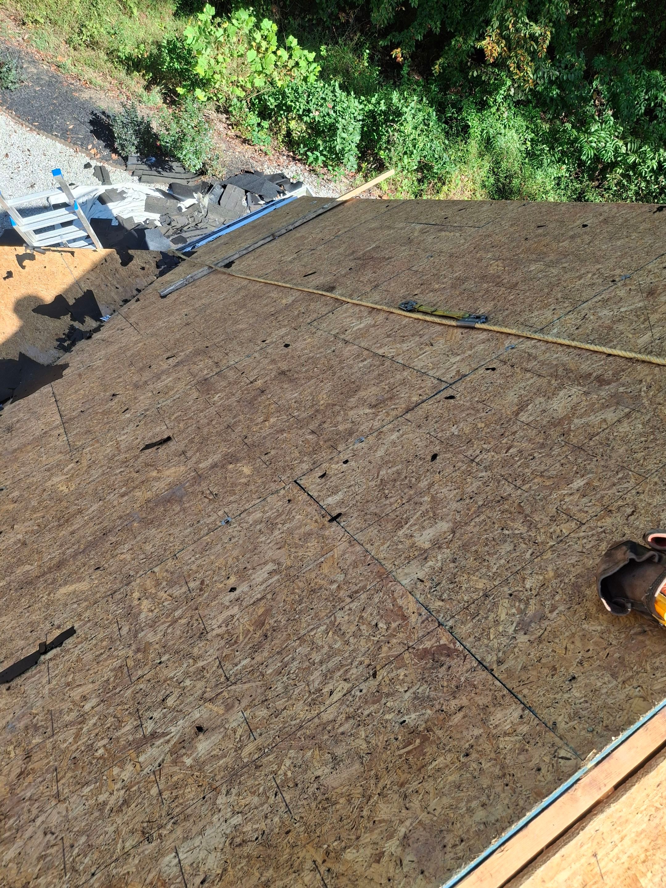 Residential Roofing Installation using GAF Timberline HDZ Charcoal by Rainstoppers Roofing