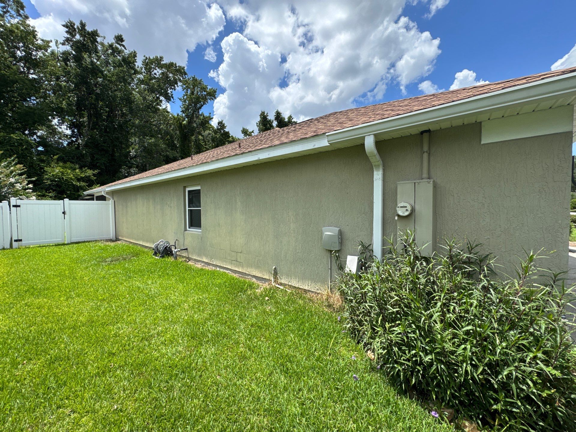 Stucco Exterior Repainting with White Soffits & Fascia | Hampton Park, Jacksonville, FL by A New Leaf Painting, LLC