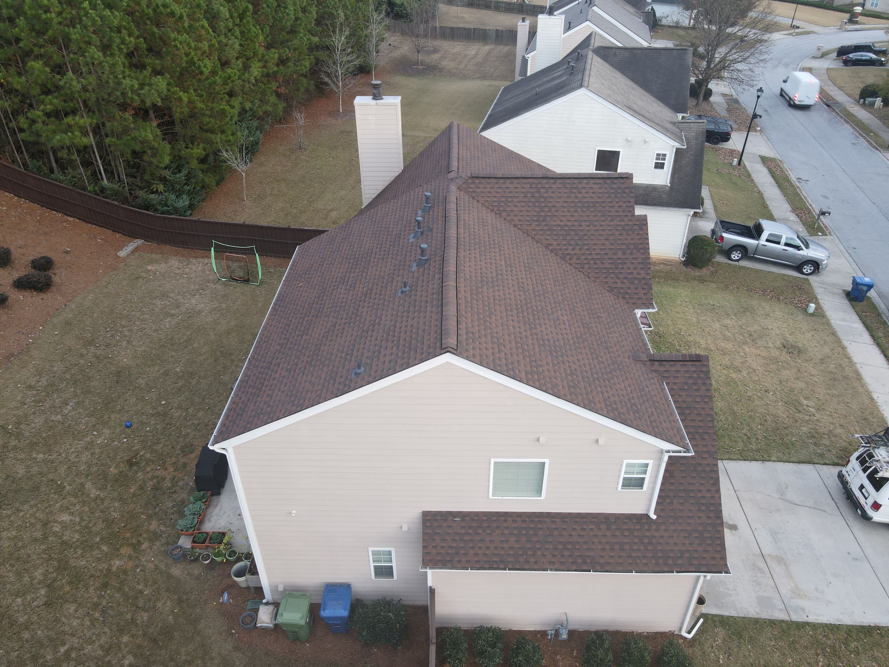 Residential Roofing Installation using Timberline HDZ Hickory  by Inspector Roofing and Restoration