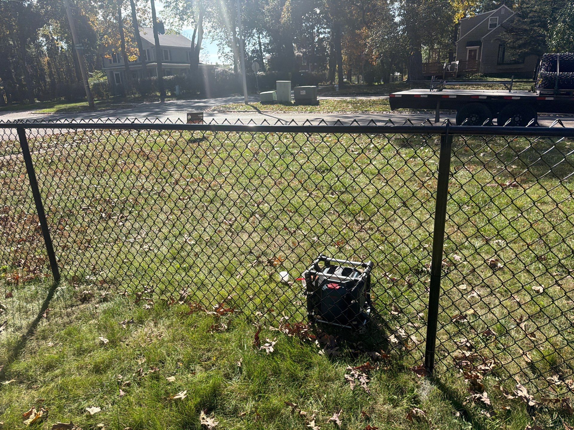 Residential Black Chain Link Fencing in Cedar Falls by Perfect Picket Fence and Stain