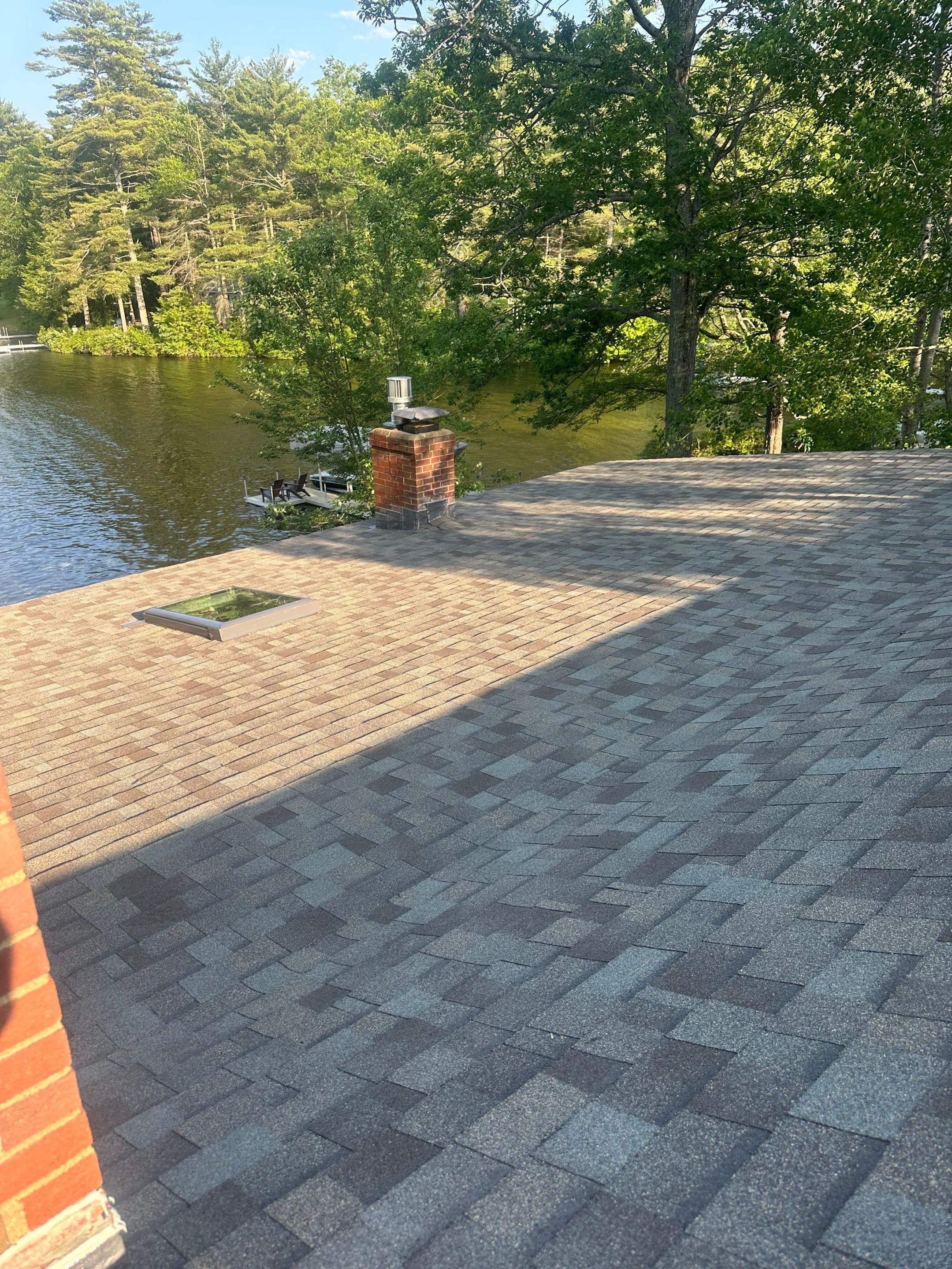 OC Roof Install On The Lake In Deerfield, New Hampshire by Tall pine roofing