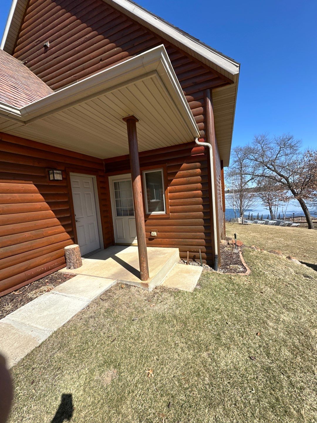 Cabin in Pequot Lakes. Rotted log siding by Koska construction llc