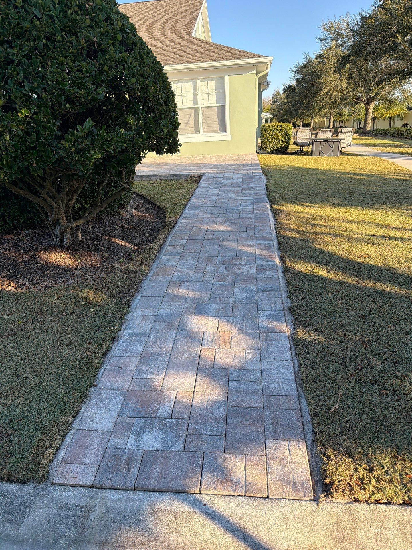 Multi-Toned Paver Patio and Walkway sealing in Mira Bay Apollo Beach by Supreme Paver Experts