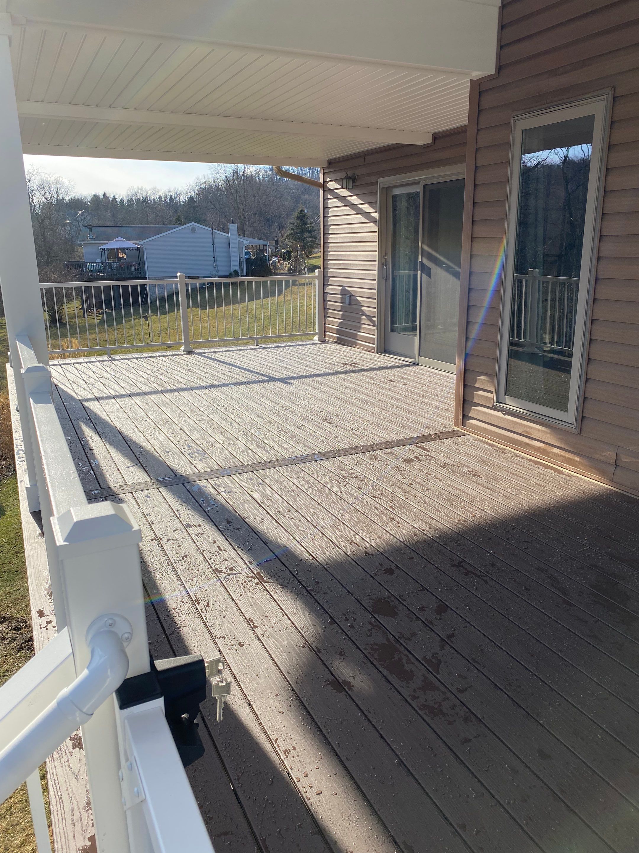 Deck and Roof Build by Cousins Roofing Siding & Decks