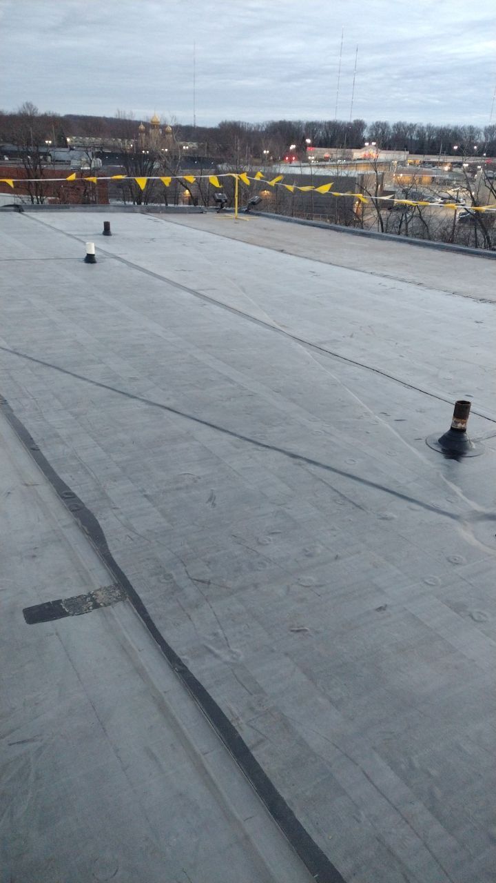 Commercial flat roof parma by Absolute Roofing and Construction