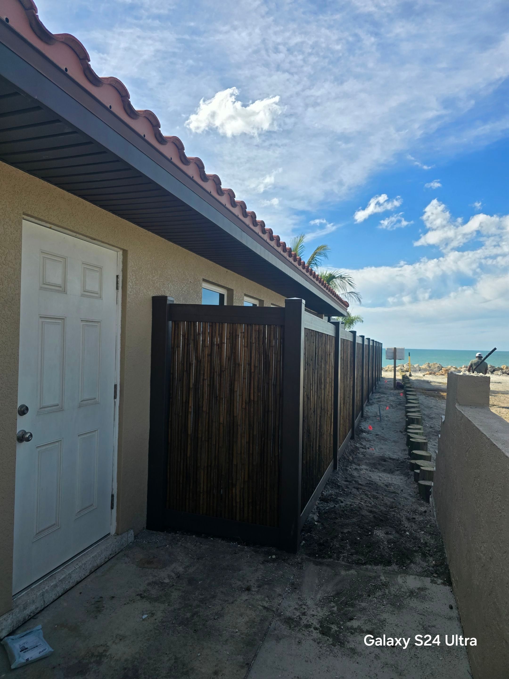 Custom Bamboo Vinyl Fence in Manasota Key by True Fence LLC
