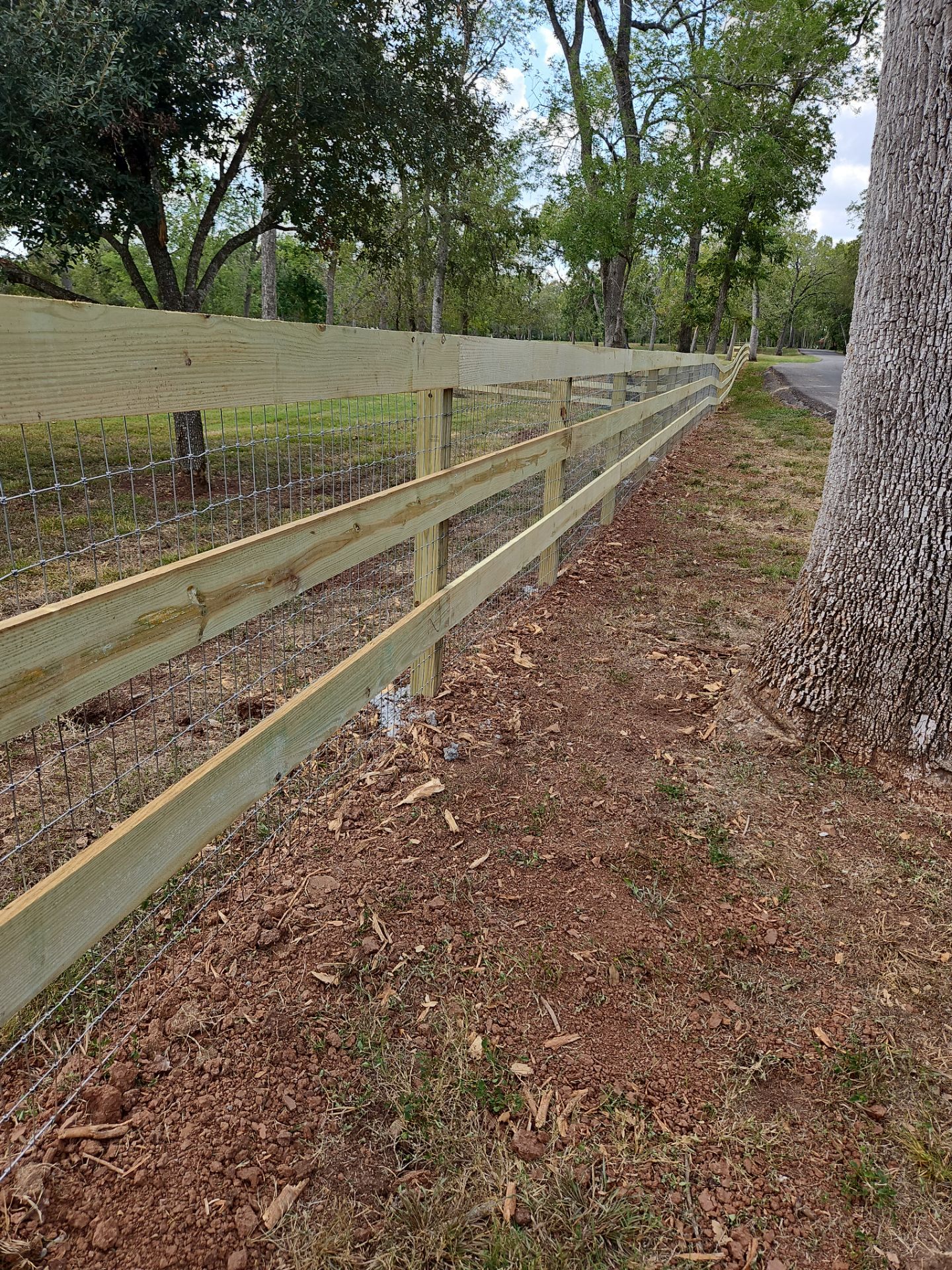Ranch Style fence Plus Iron installation by Tim's Fences