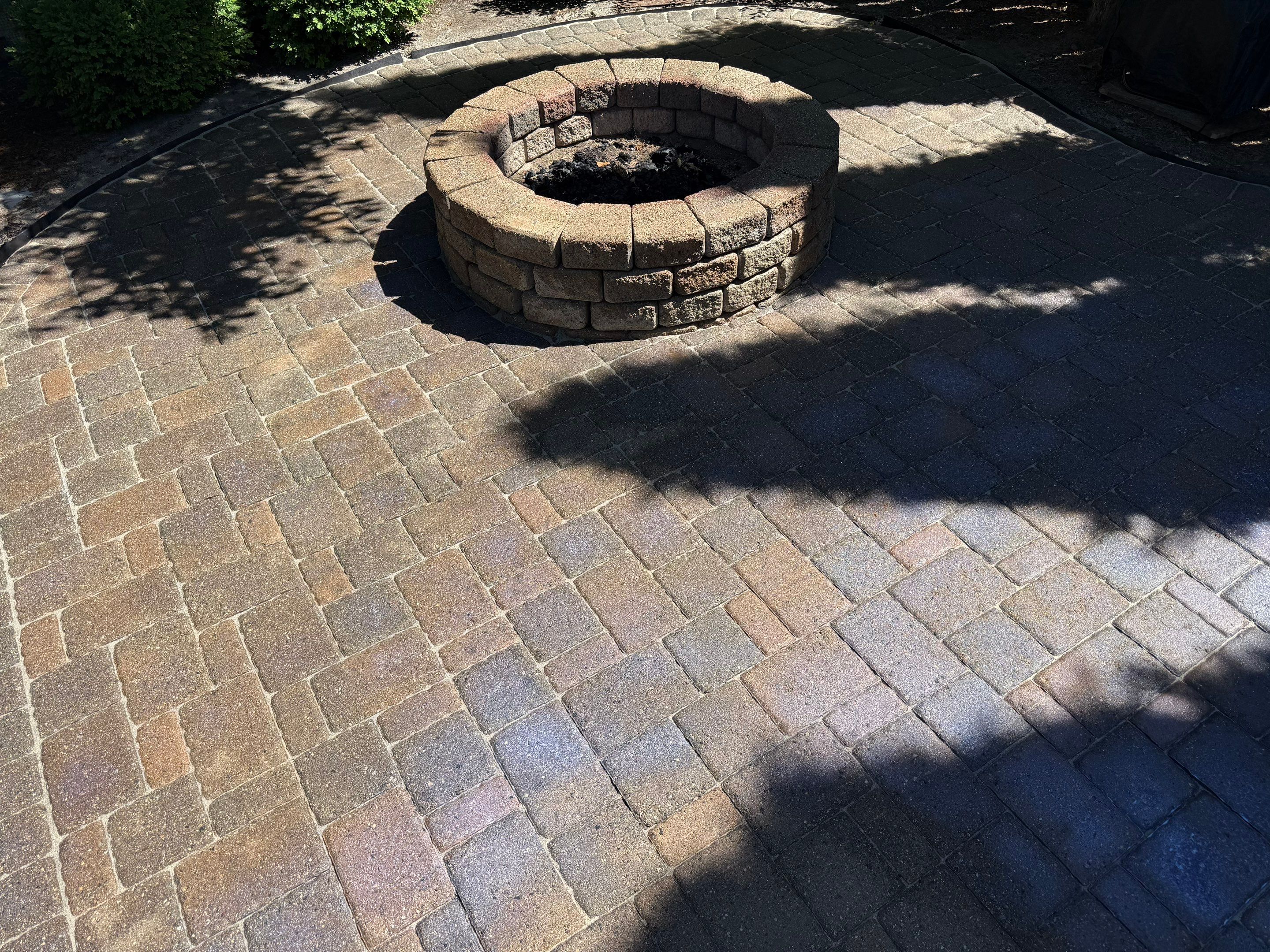 Textured Concrete Coating and Paver Patio Refresh in Sioux Falls by Select Painting, Coatings & Garage Cabinets