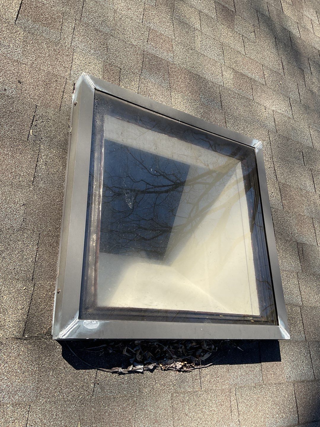 Install new shingles and new skylights  by Alpha Design Services