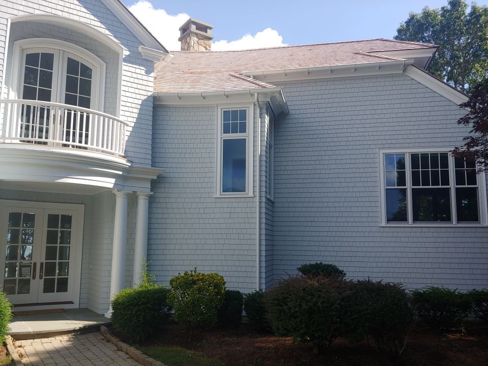 Gutter Installation using 6" Half Round Aluminum Gutter over Crown Moulding by Gutter Pro Enterprises
