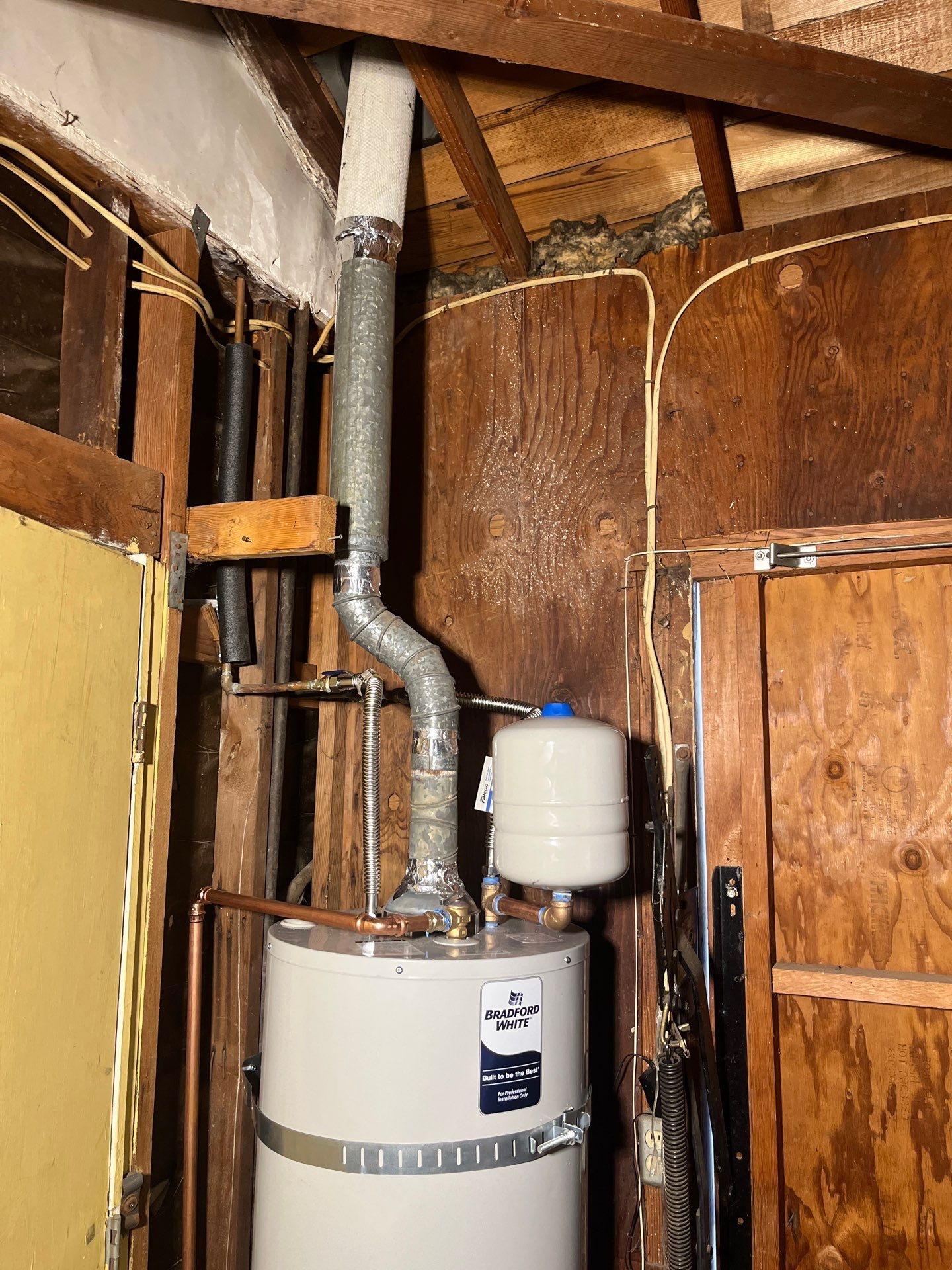Water Heater Installation and Outside Piping by Us Plumbing