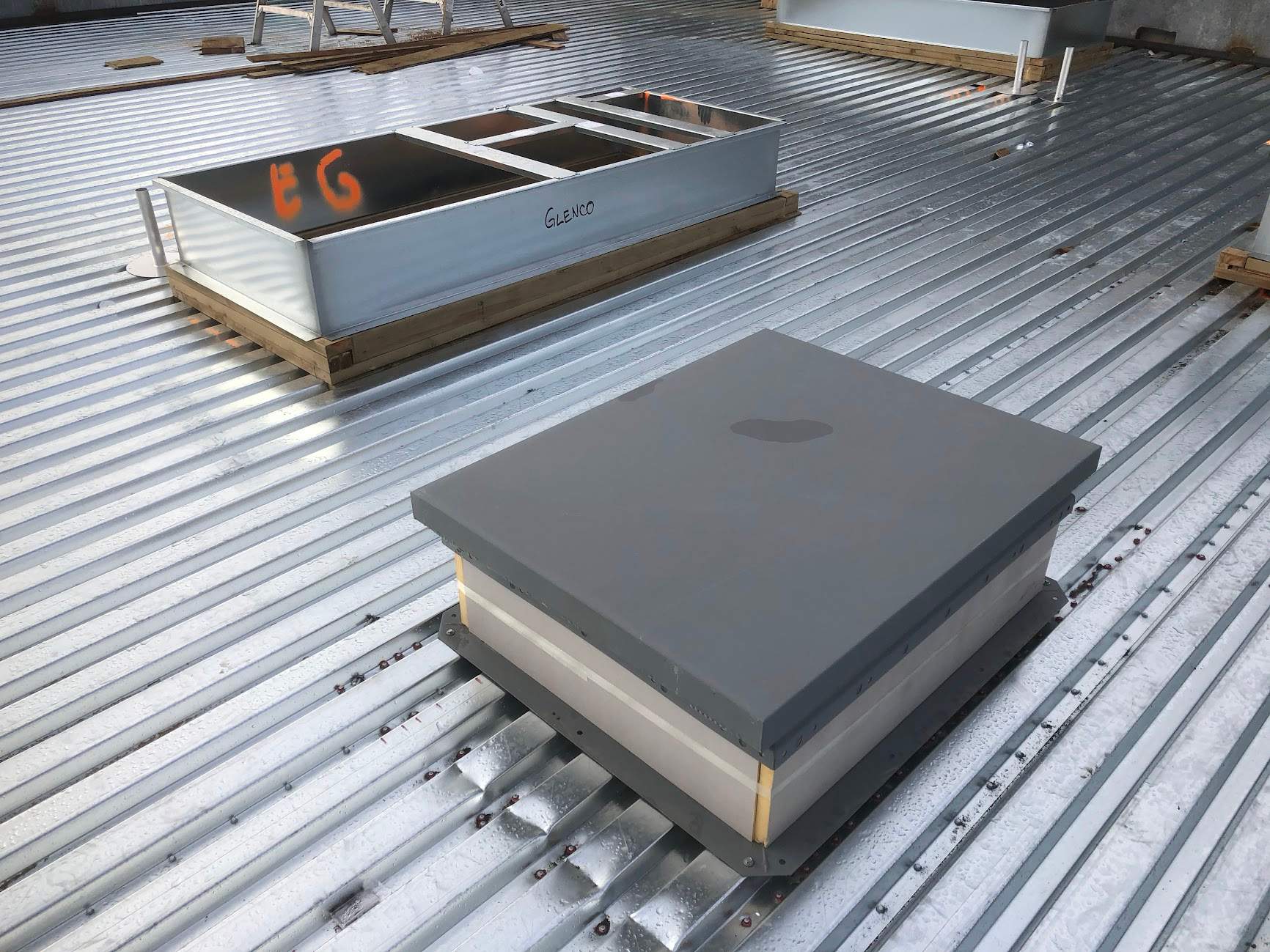 Commercial Roofing Installation using EPDM loose lay with balast by Top Notch Roofing Inc