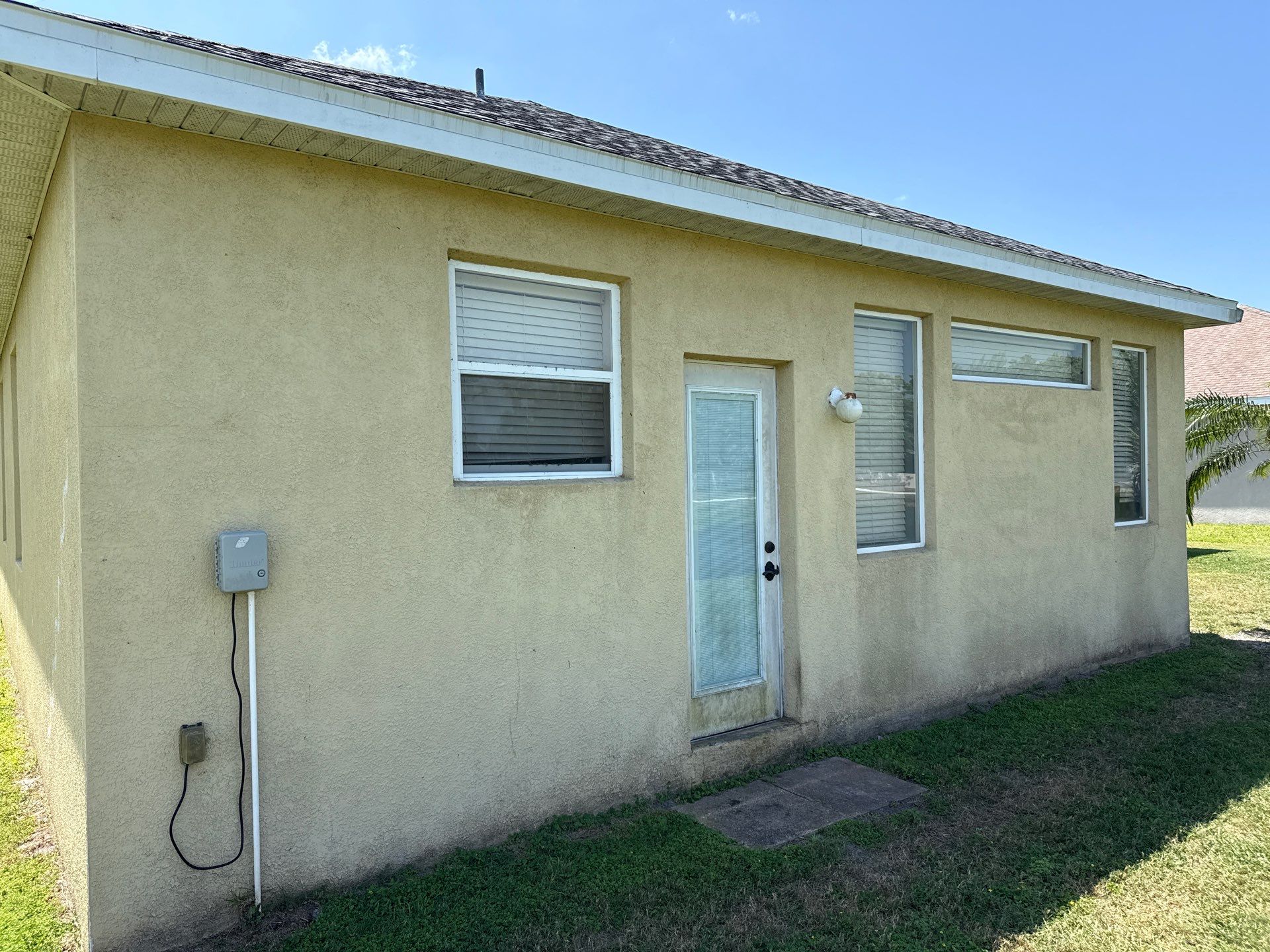 Driveway & Rear Wall Soft Wash | Lexington Community | Parrish, FL | Sunshine AquaWash by Sunshine AquaWash