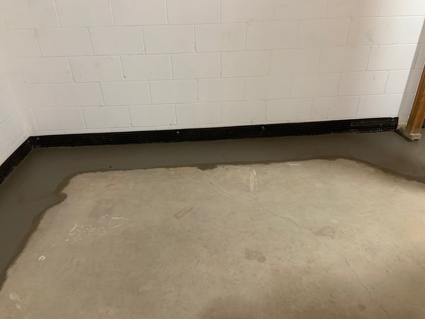 Correcting an Improper Installation for Alan in Chanhassen by Waterproofing Northeast