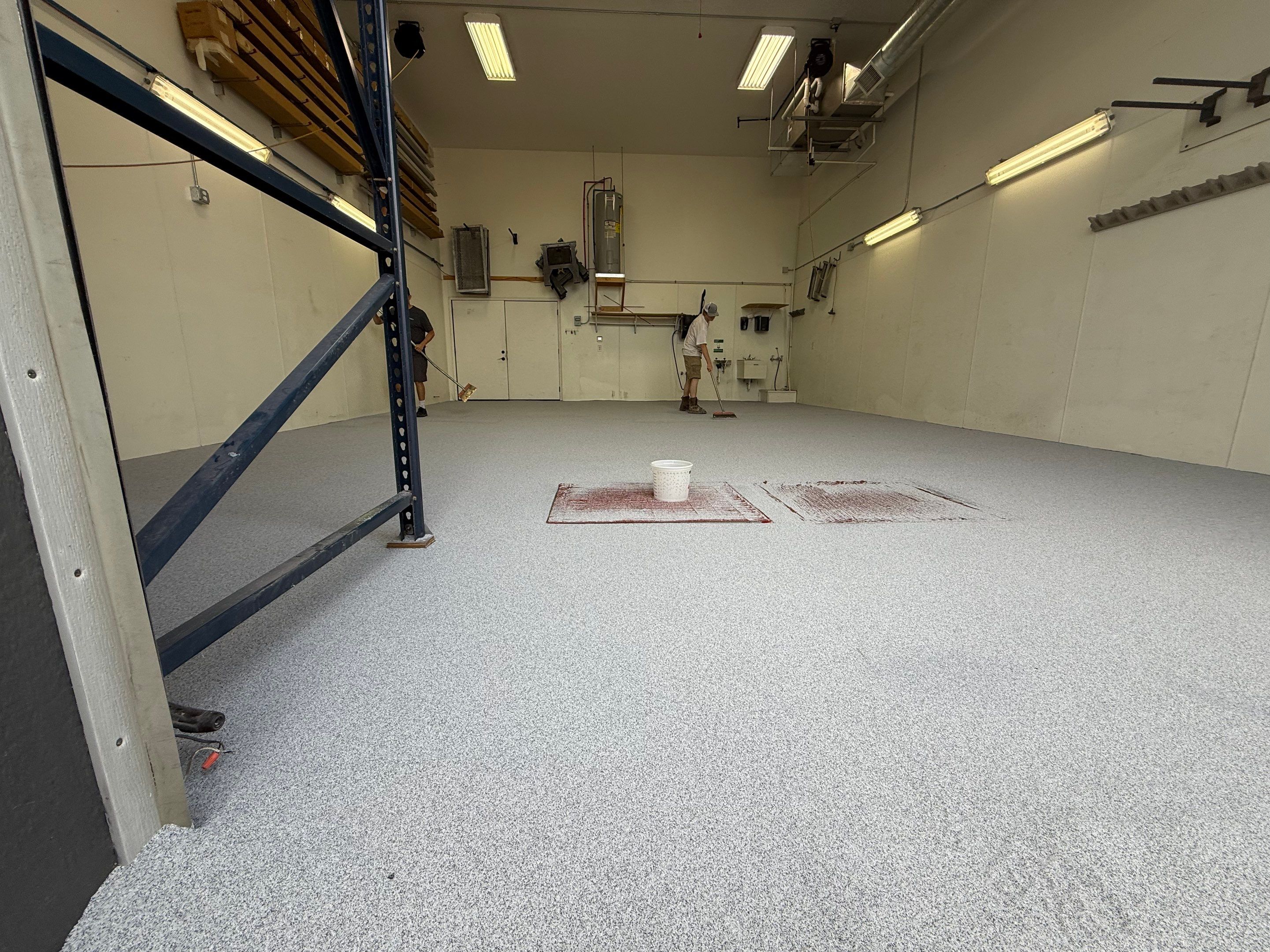 Commercial Grey Speckled Epoxy Floor Coating for Industrial Workshop by Select Painting, Coatings & Garage Cabinets