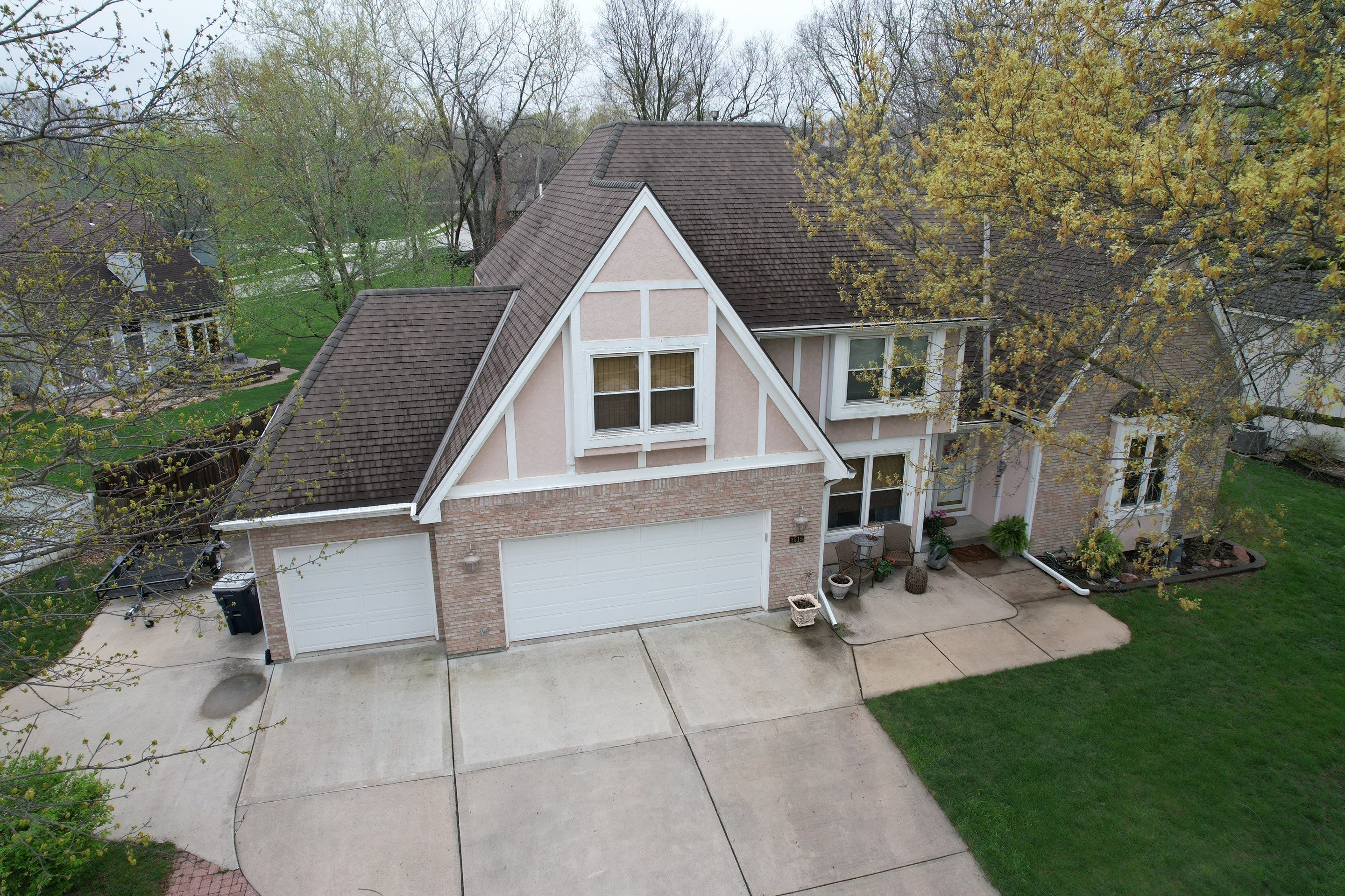 Comprehensive Roof Replacement and Skylight Installation in Kansas City by Liberty Roofing