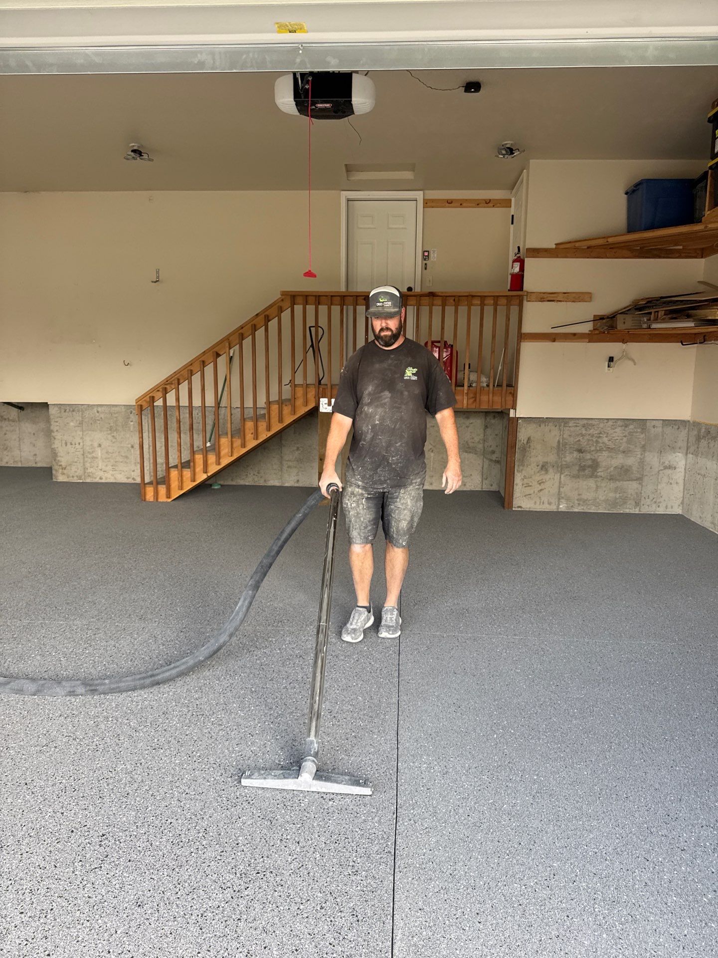Custom Gray Speckled Polyaspartic Garage Floor Coating in Cheney by Croc Coatings, LLC