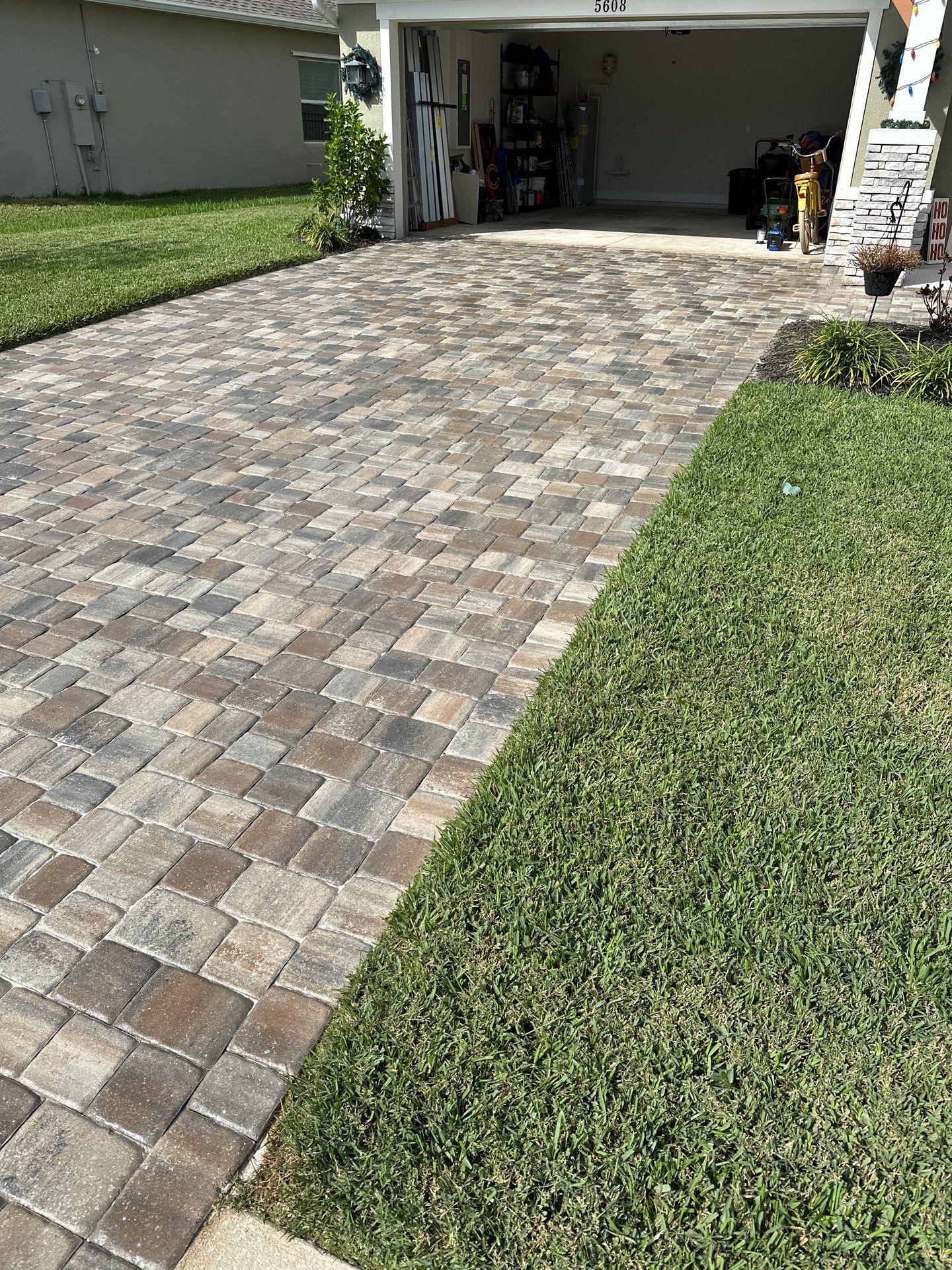House Wash, Paver Driveway & Sidewalk Cleaning + Sanding & Sealing in Trevesta Community, Palmetto, FL by Sunshine AquaWash