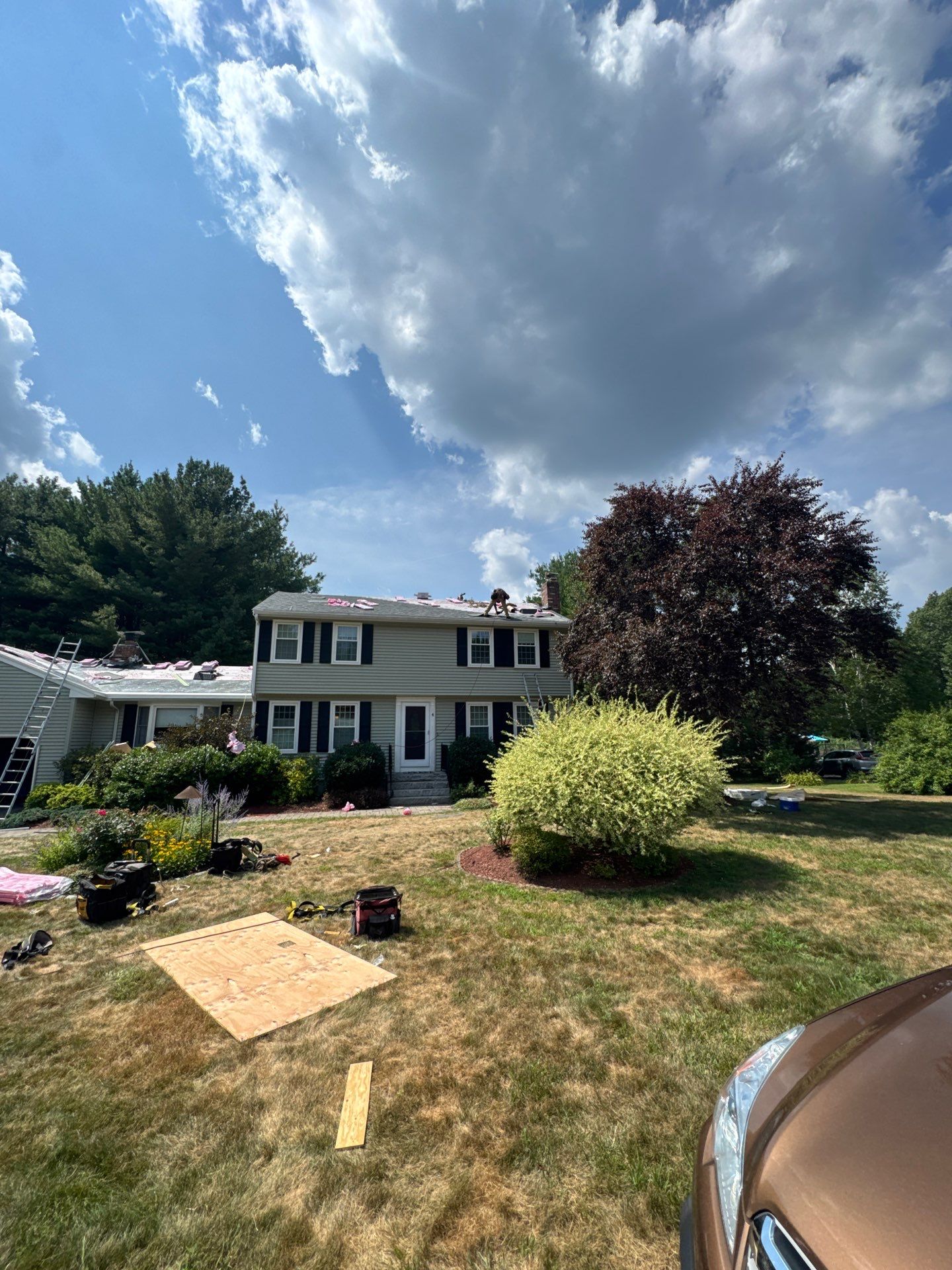 Complete Roof Replacement with Chimney Flashing, Gutter Guard System, and Vinyl Siding Repairs by Mighty Dog Roofing of Greater Middlesex County