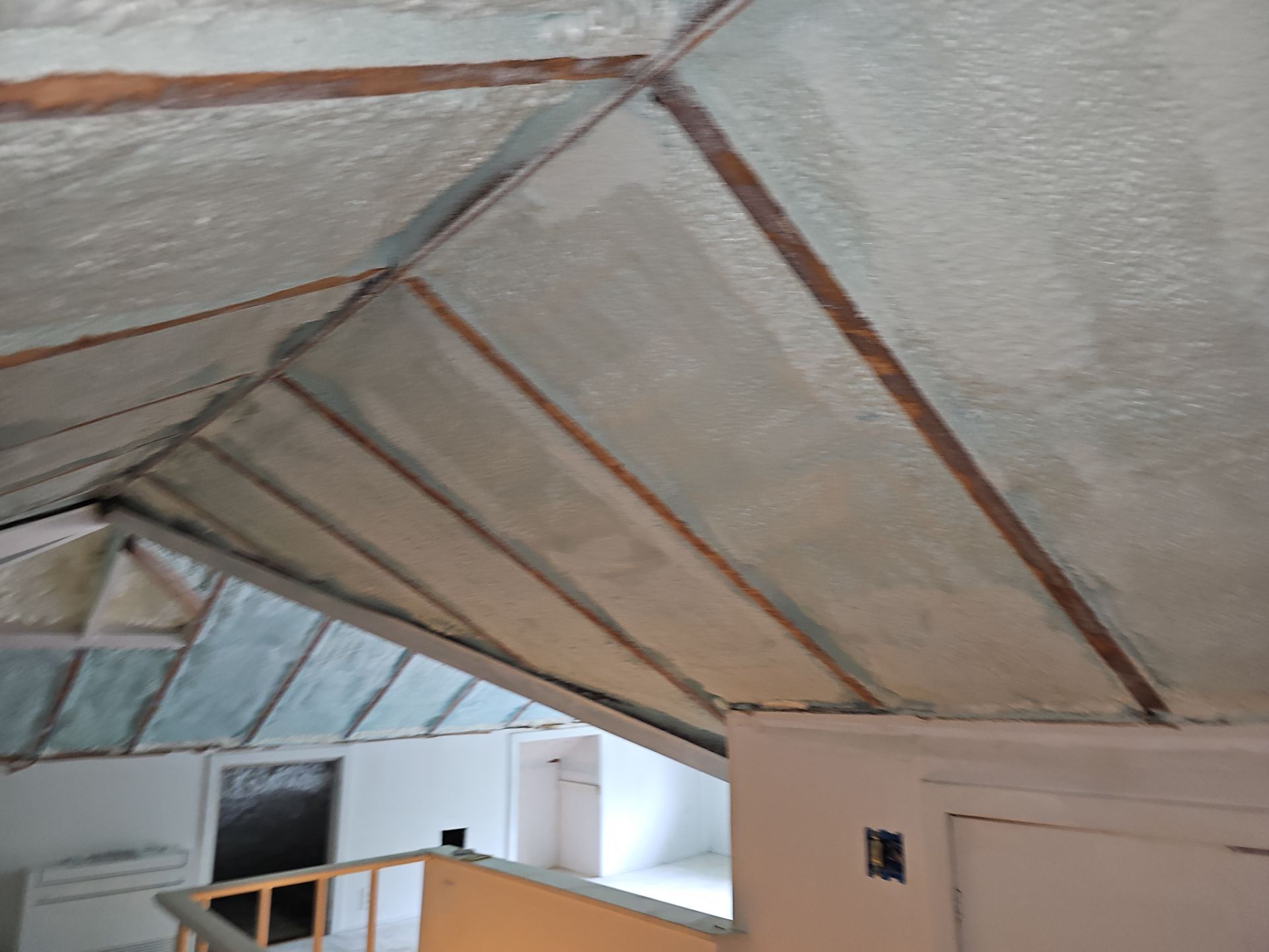 Attic Insulation using open cell spray foam by NYS Foam & Energy