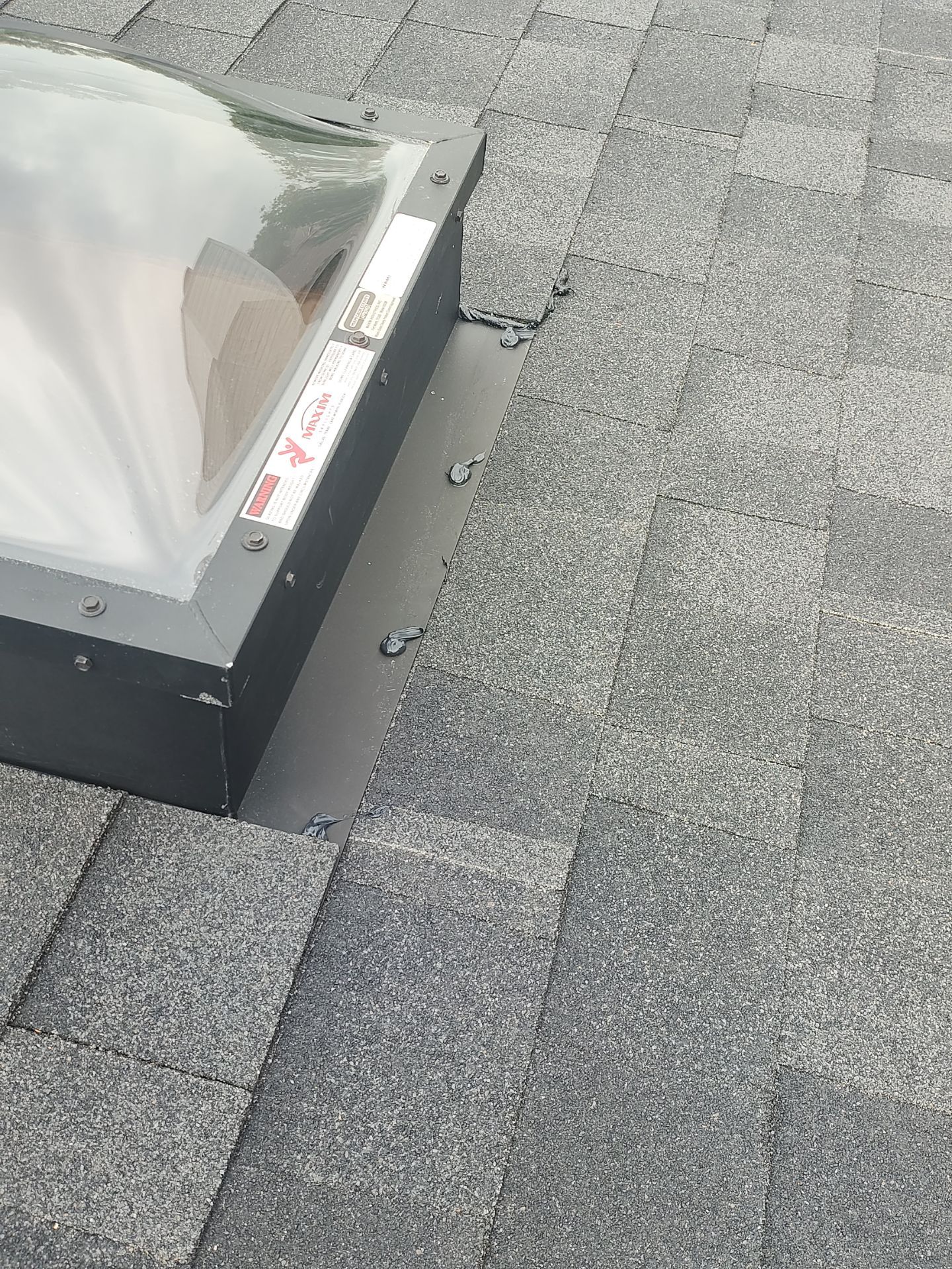 Nothing looks nicer than a little black roof by Bayfront Roofing and Construction