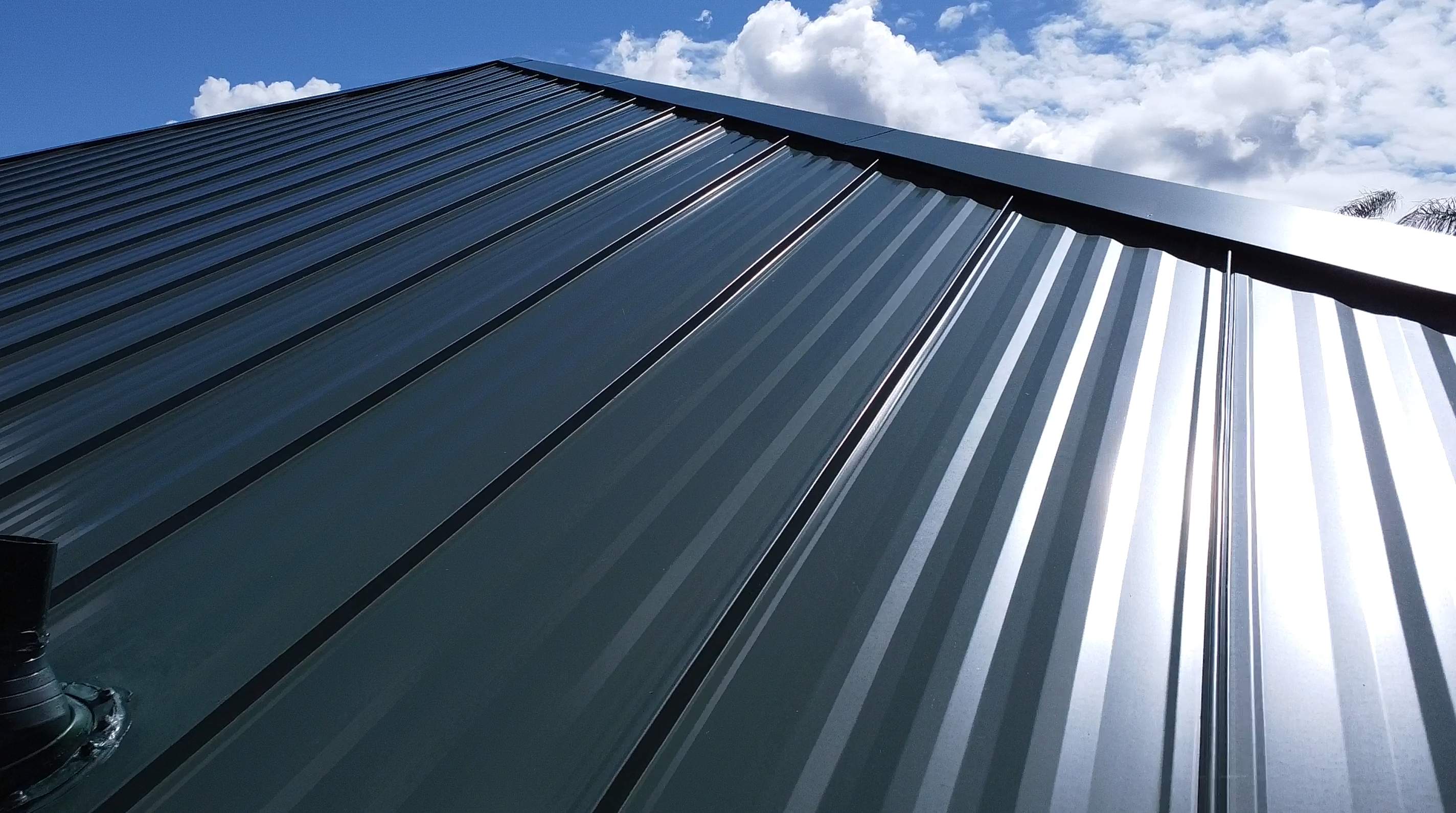 Kynar (Color Coated) Standing Seam Metal Roof Replacement by Sailfish Roofing