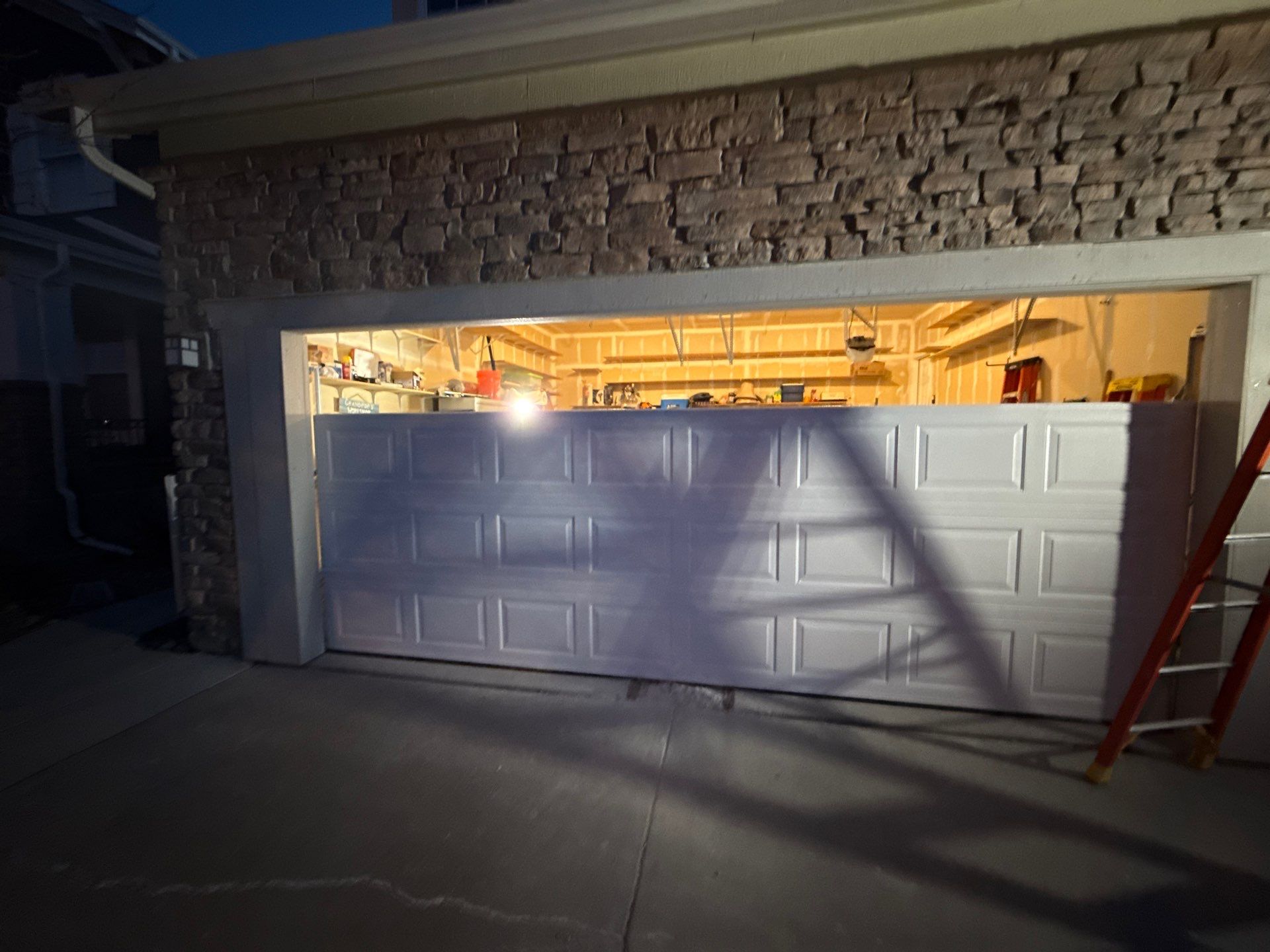 Garage door conversion by David & Goliath Contracting 
