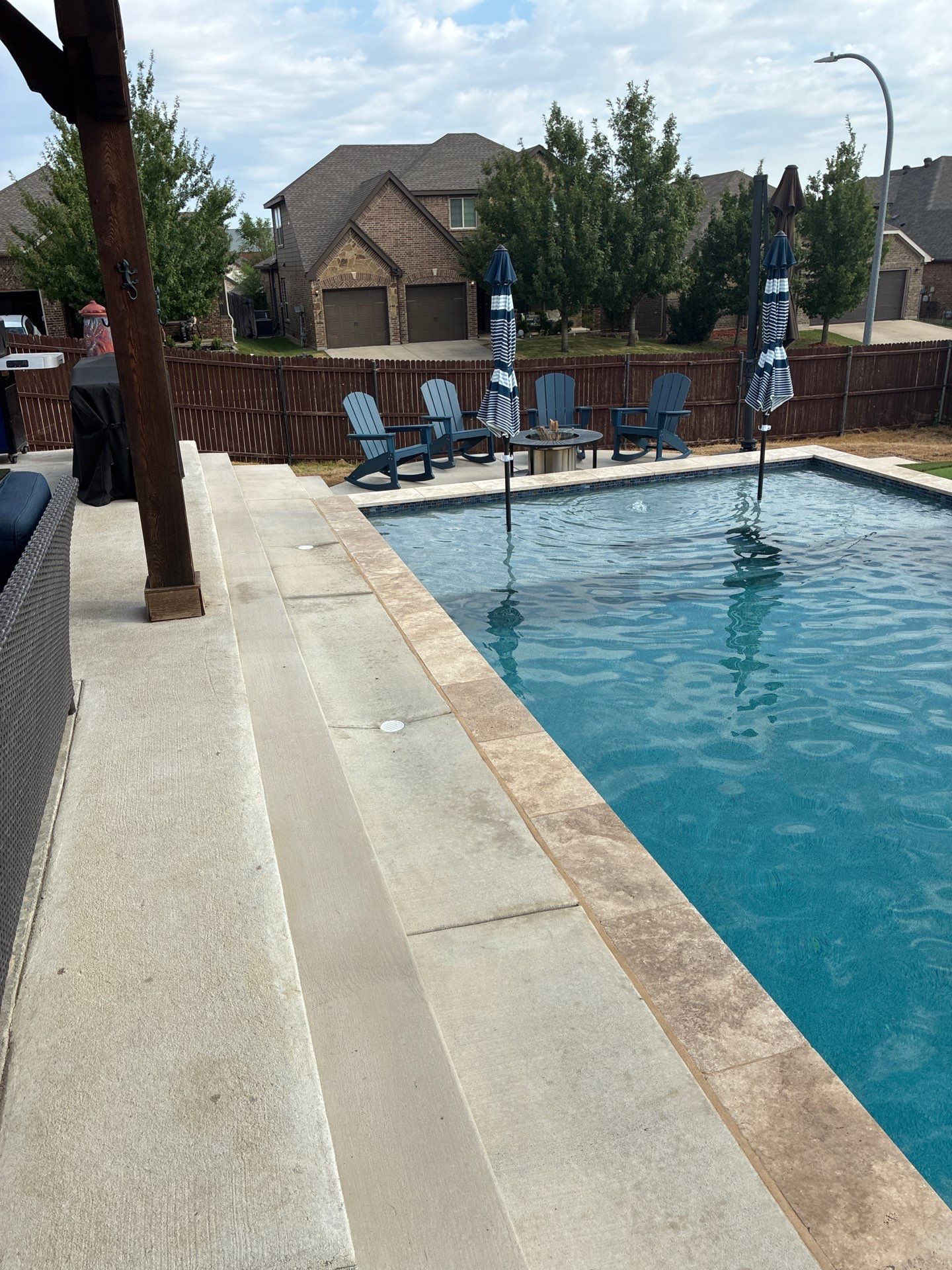 Geometric Pool with Raised Spa and Spillway by Pinnacle Pools and Spas - DFW