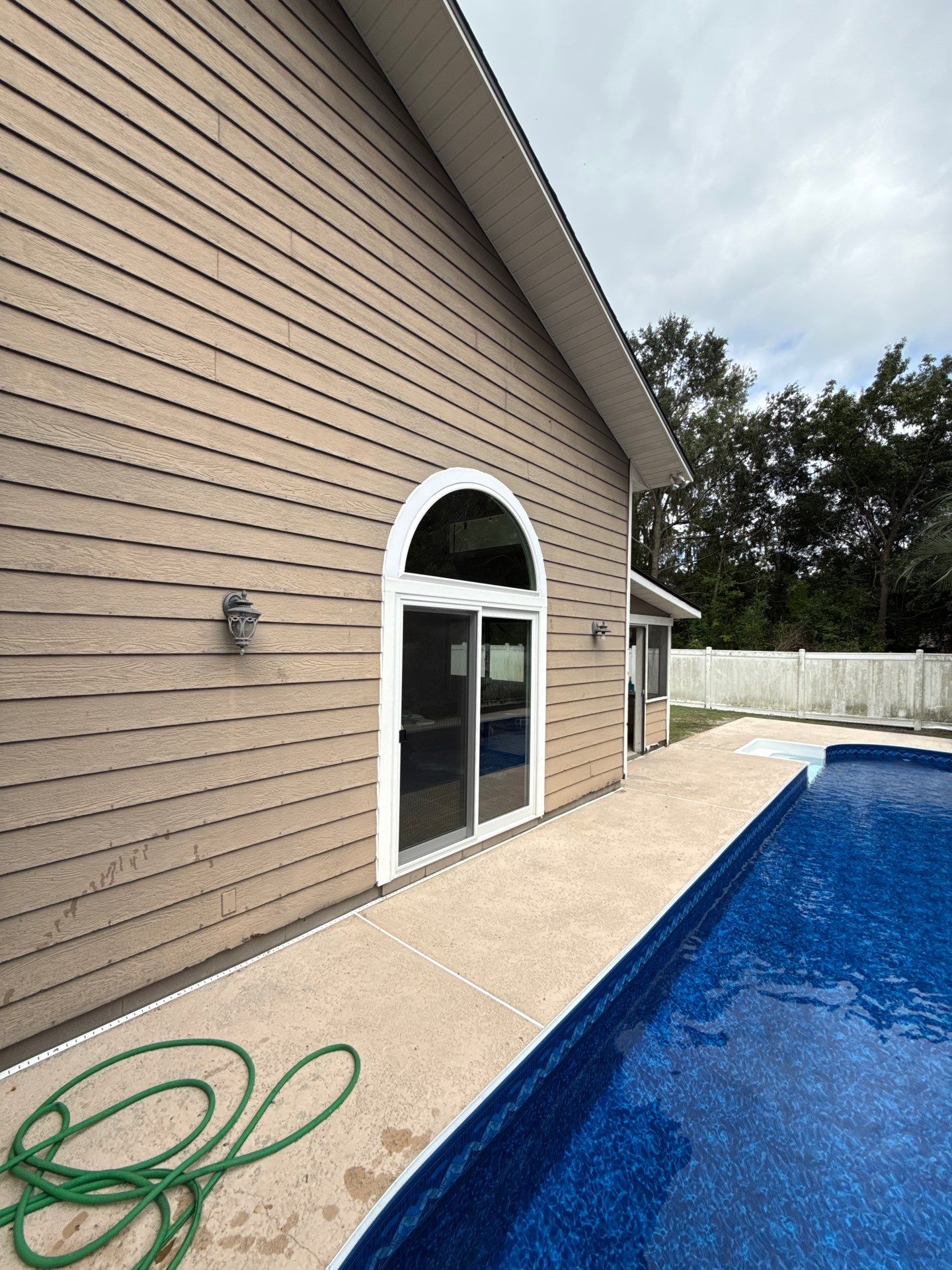 Custom Arched Transom and Sliding Patio Door Replacement in Gainesville by Windows & Doors Store