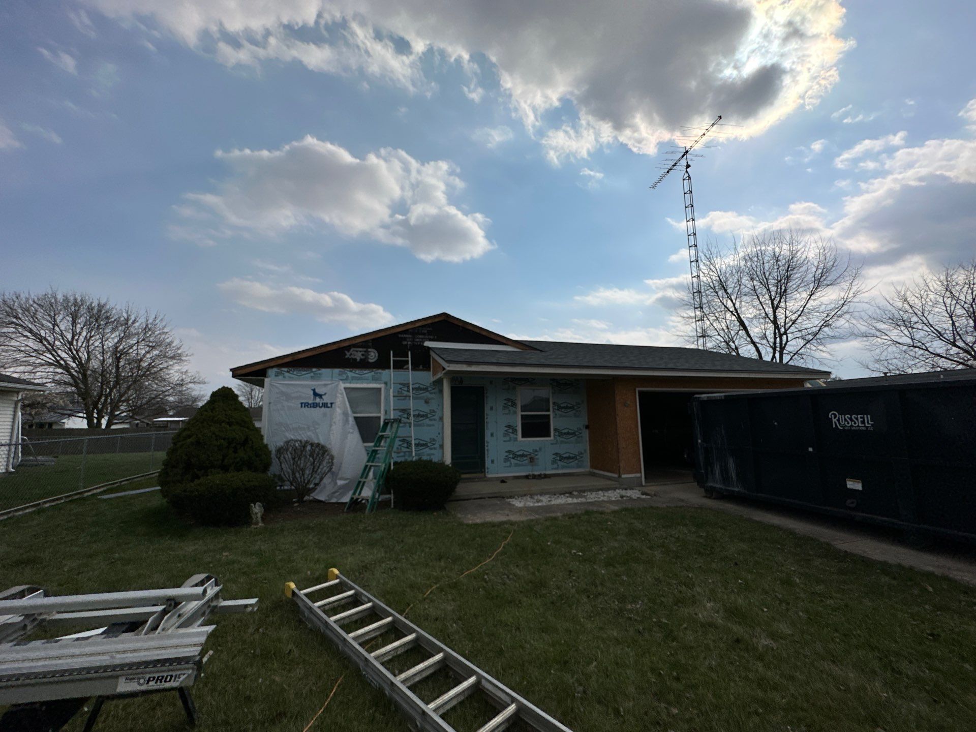 Storm Damage Residential Roof and Siding Installation by WIW Enterprises Inc