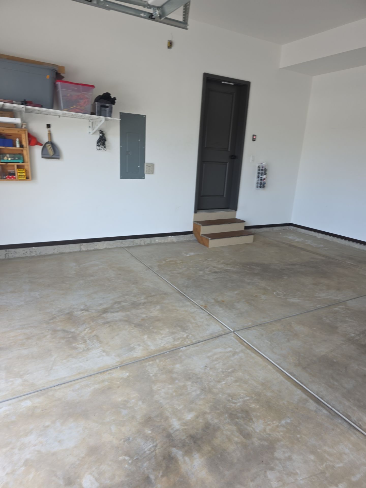 Polyurea Garage Floor Transformation with Slate Hybrid Finish in Post Falls by Croc Coatings, LLC