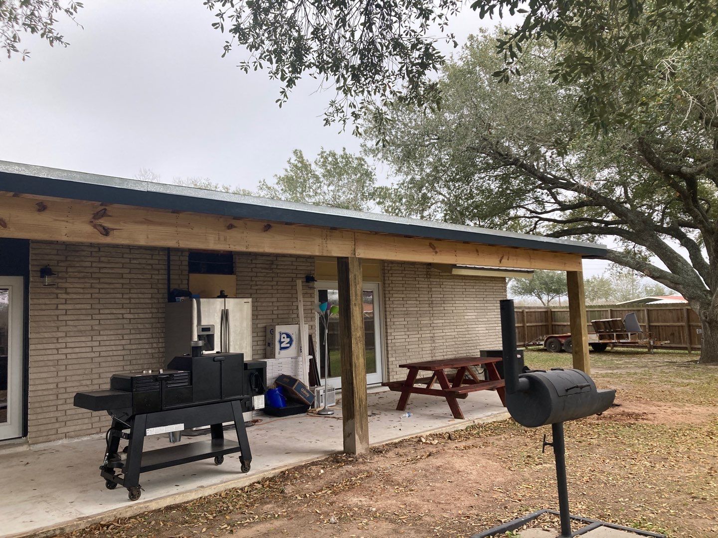 Beeville Backporch sittin' by Bayfront Roofing and Construction