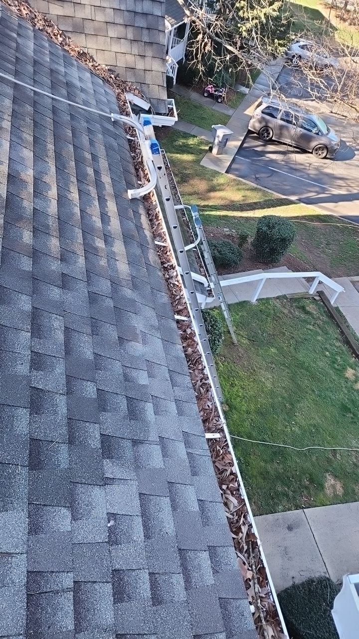 Gutter Cleaning using water by Power Wash Masters LLC