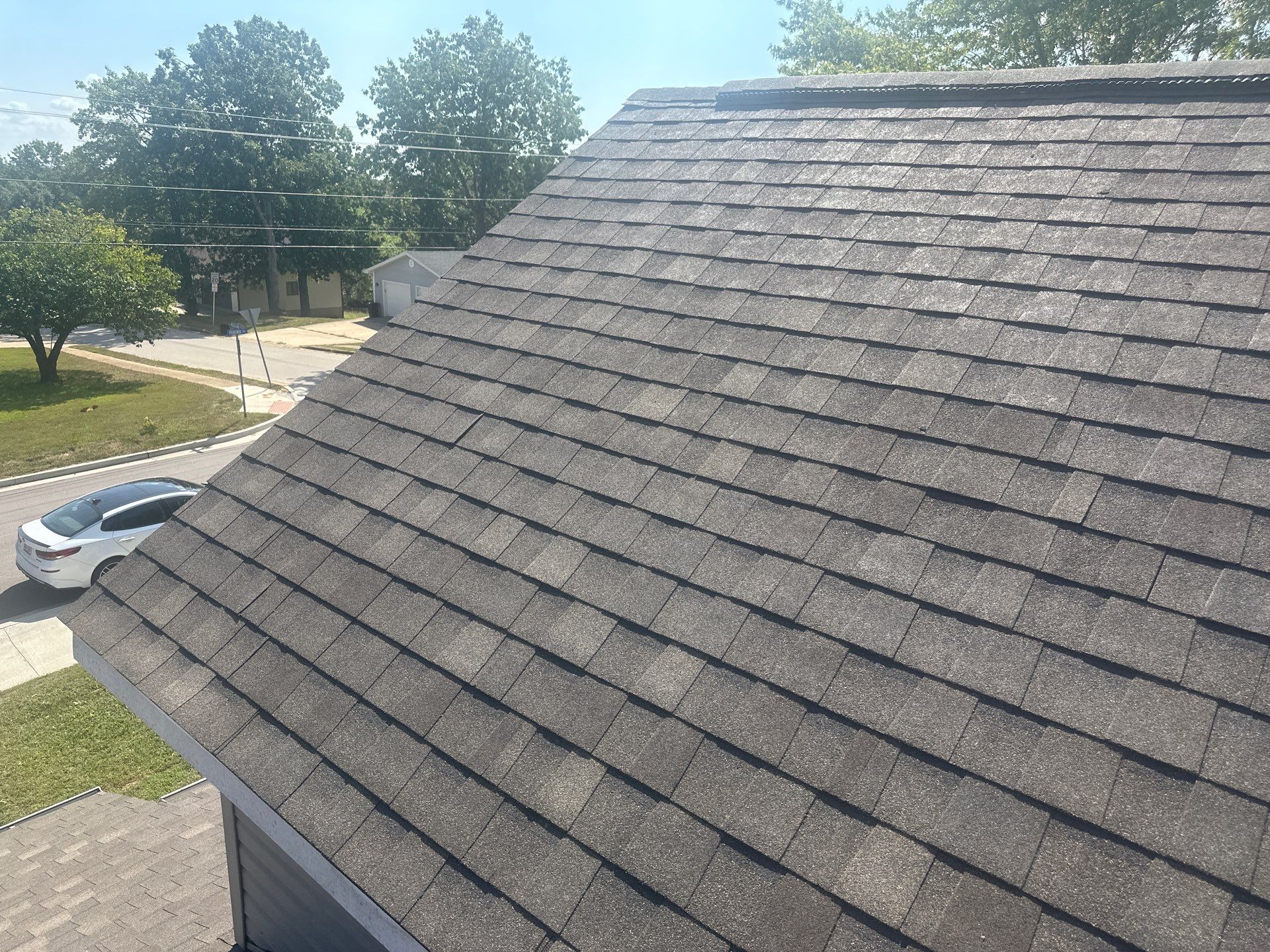Residential Roofing + Gutter & Downspouts Install  by Titan Commercial & Residential Roofing 