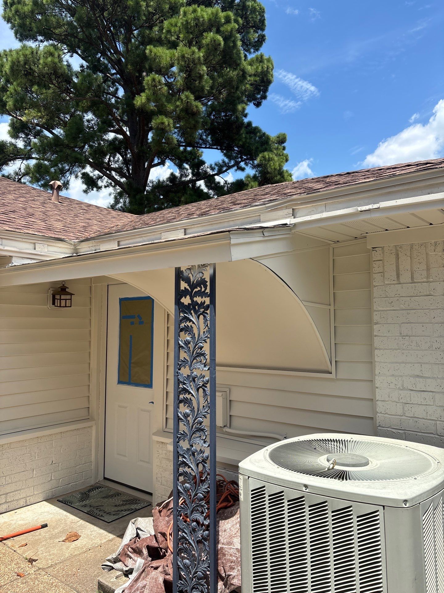 Exterior Painting in Flint, TX | White Brick Home & Metal Building with Sherwin-Williams Duration by Quality Coats Painting