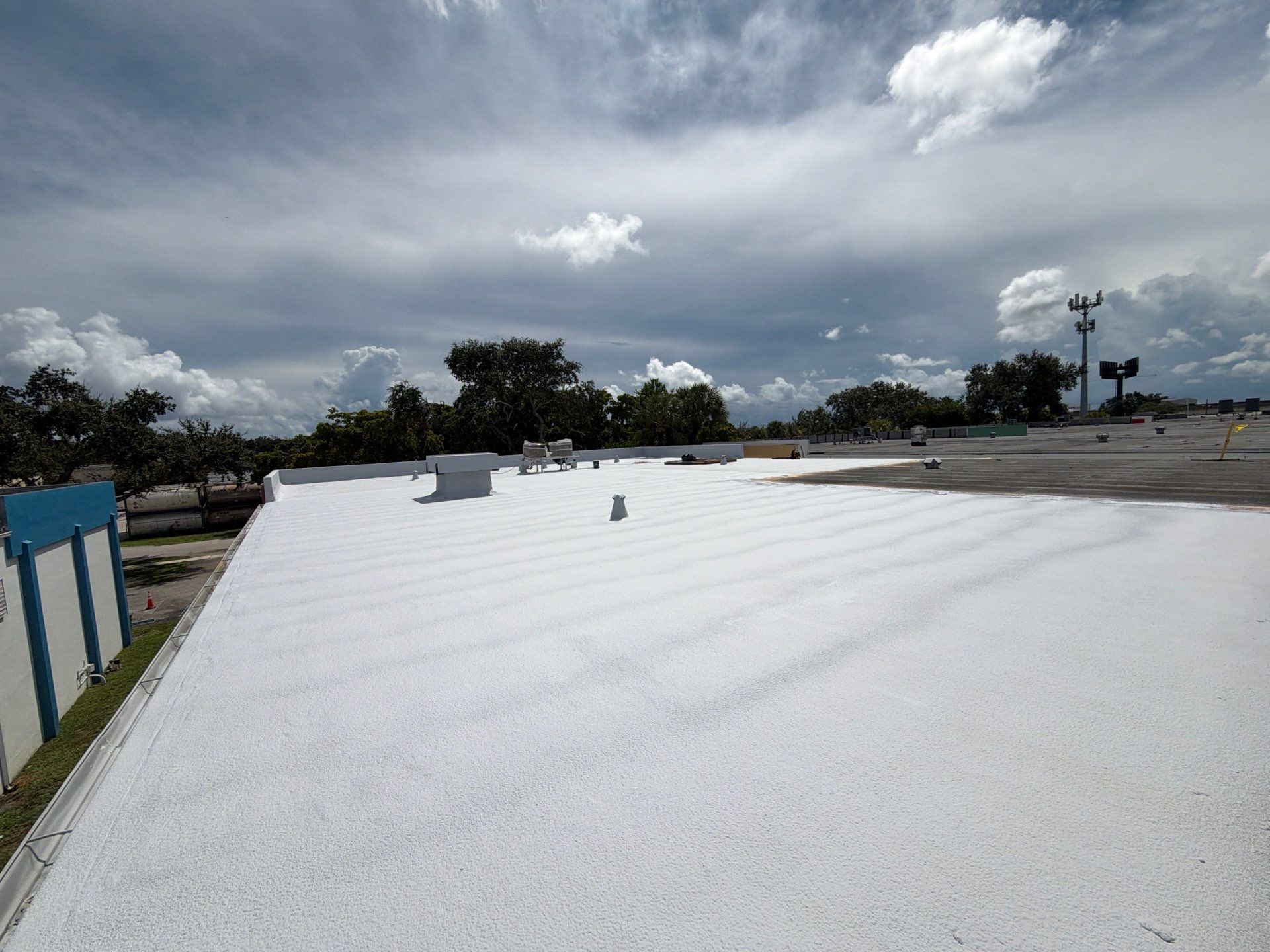 Fort Lauderdale Commercial Roof Restoration with Spray Foam and Silicone Coating by Roof King LLC