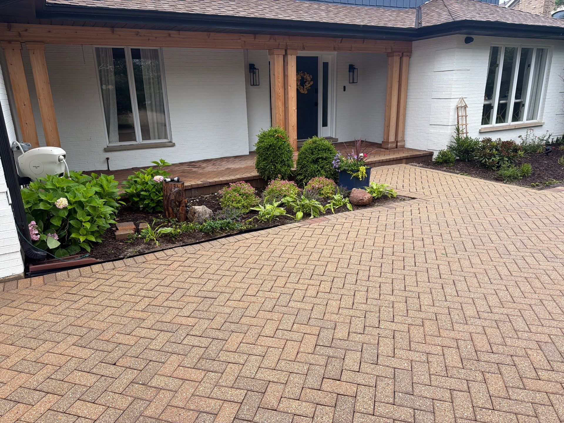 Brick paver repair, cleaning and sealing by Northern Power Washing LLC.